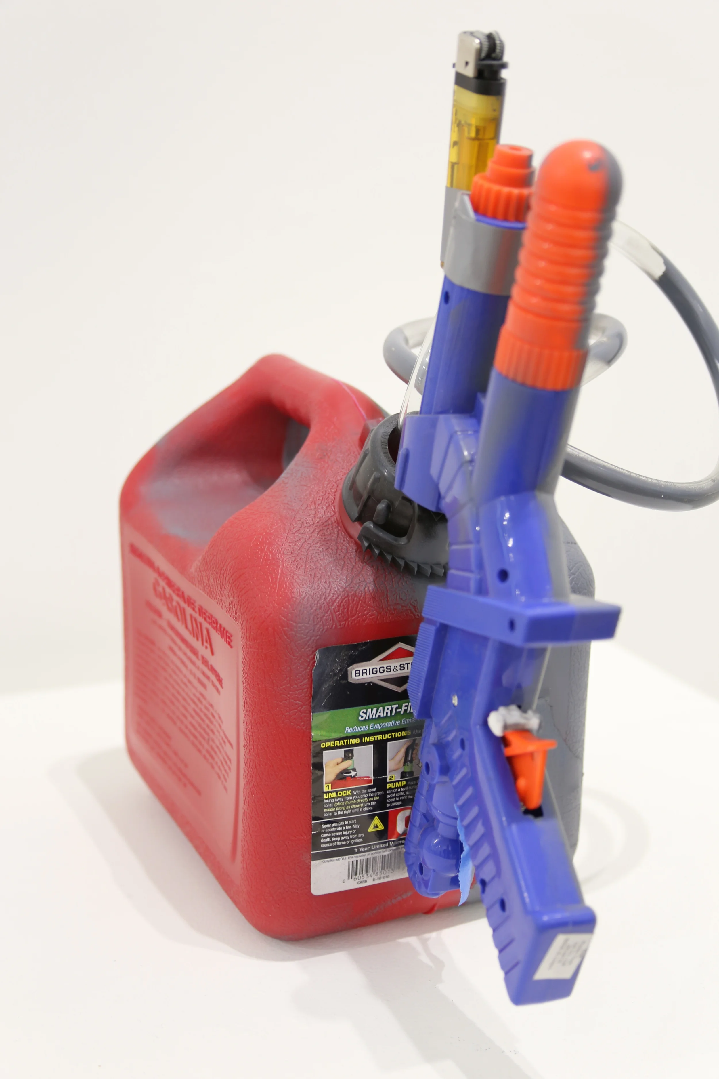   DIY Case Study #3  Gasoline tank, water gun, lighter 24" x 12" x 30" 