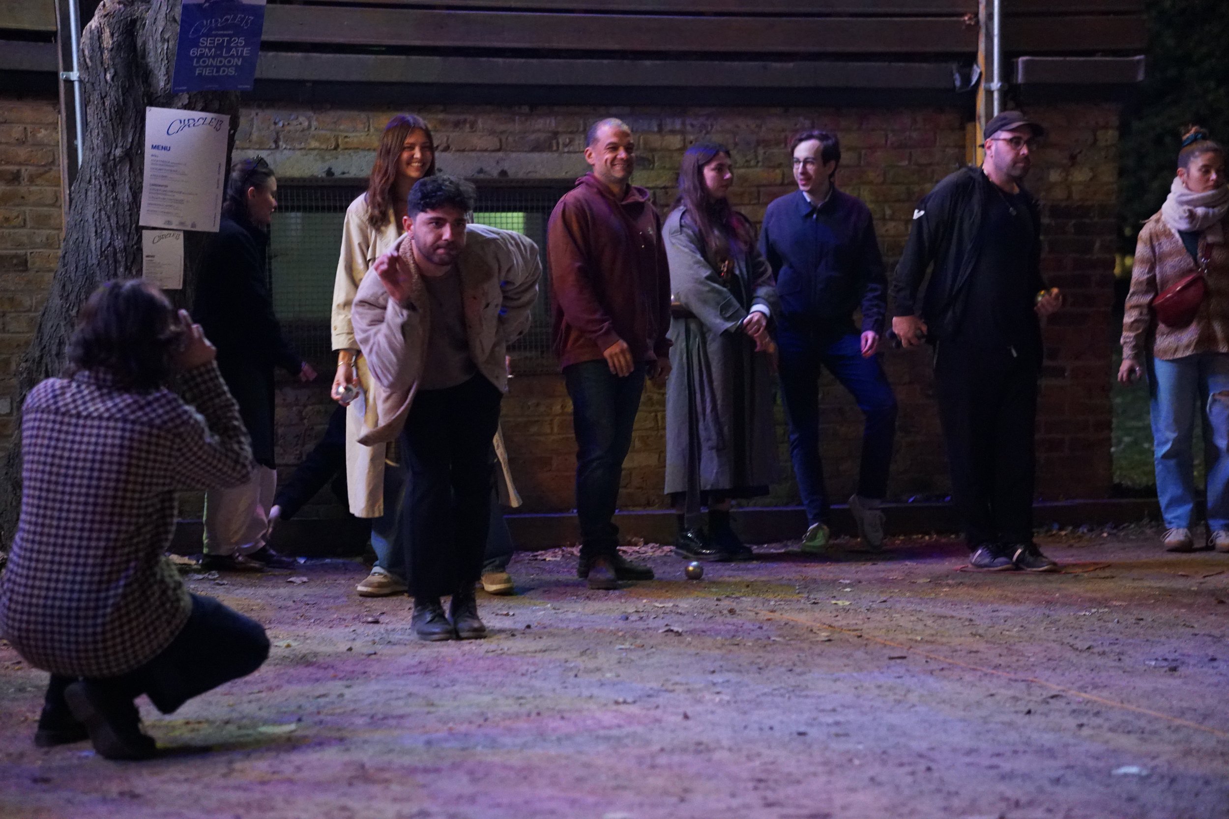 Playing pétanque on the London Fields piste at a circle13 pop-up