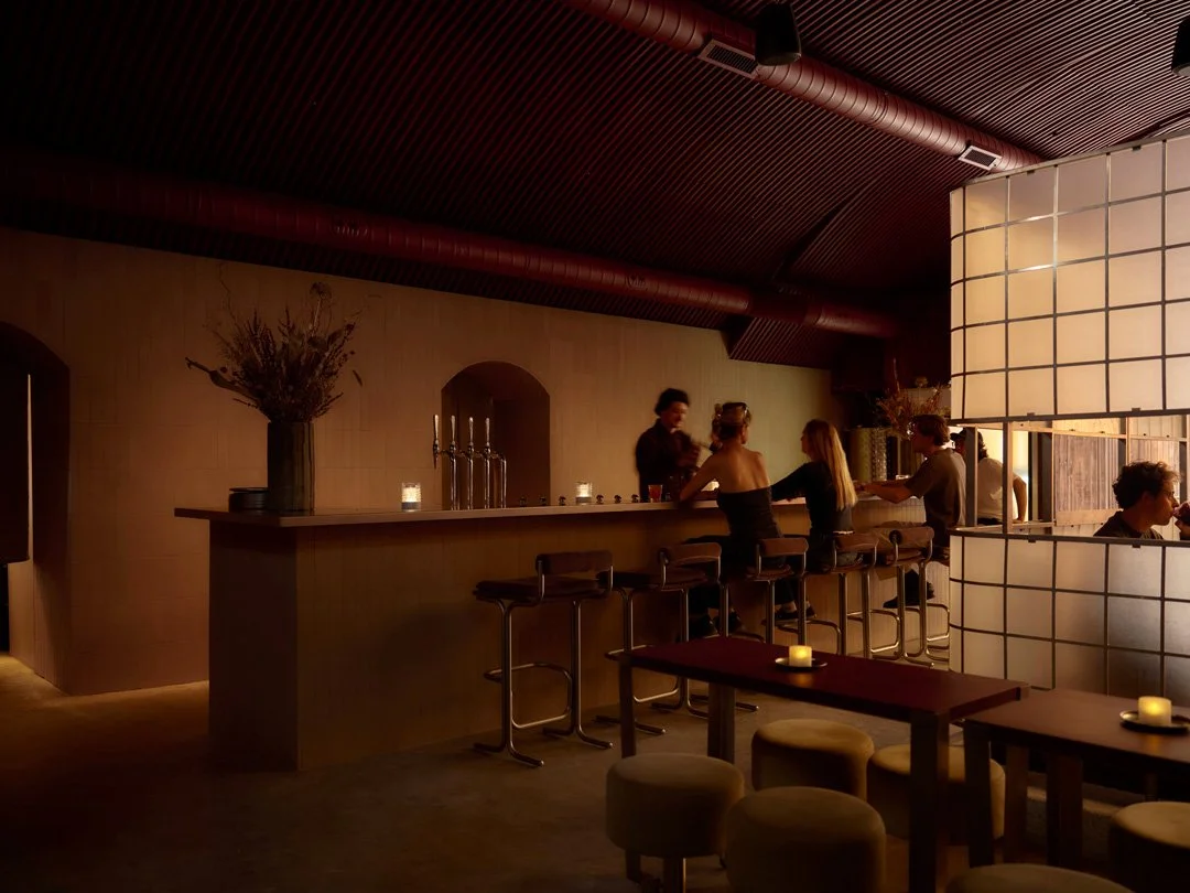 Bartenders serving guests at the circle13 bar