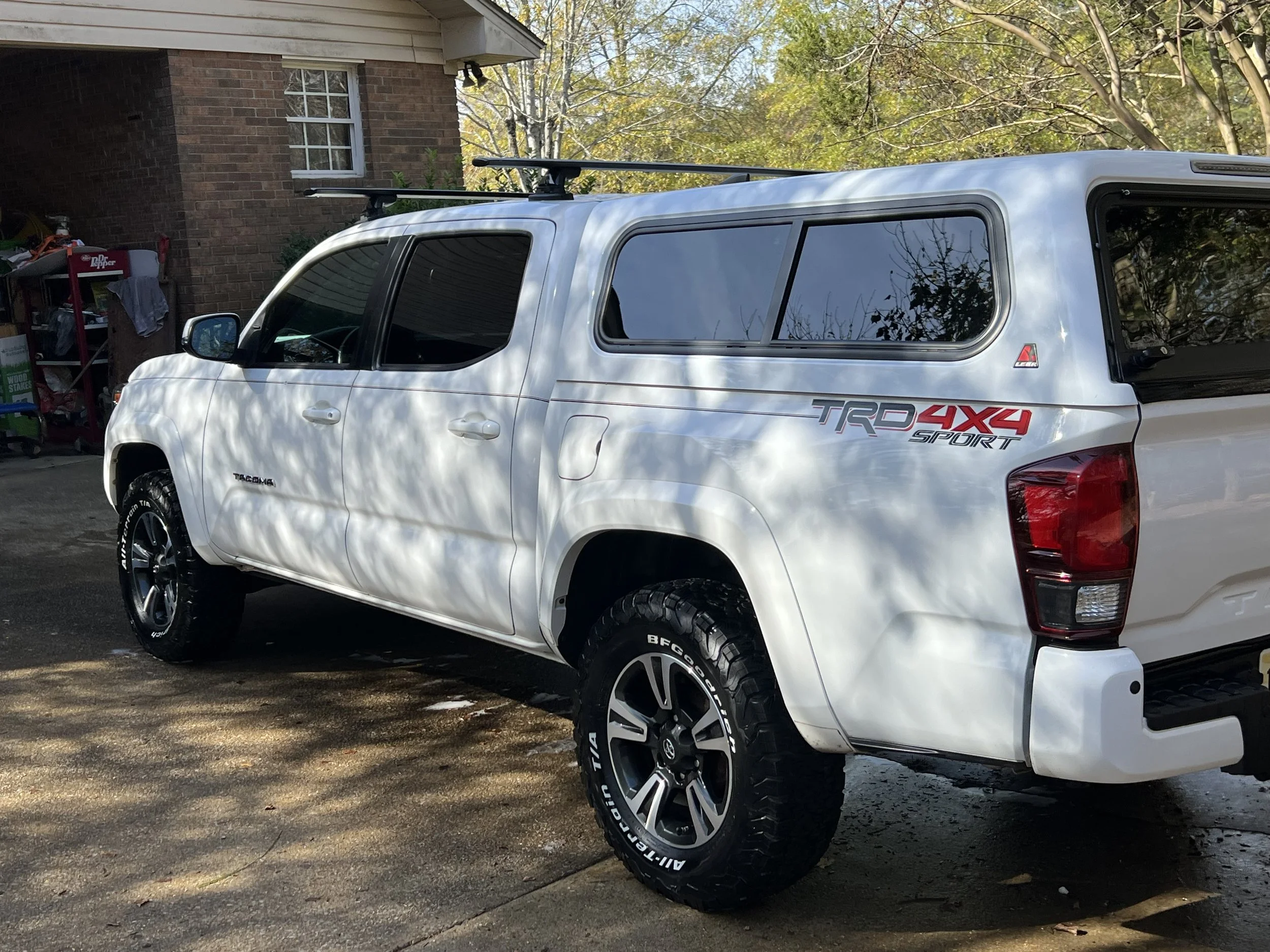 White Toyota Tacoma professionally cleaned and detailed by C5 Auto Detailing, showcasing a refreshed exterior and clean finish.