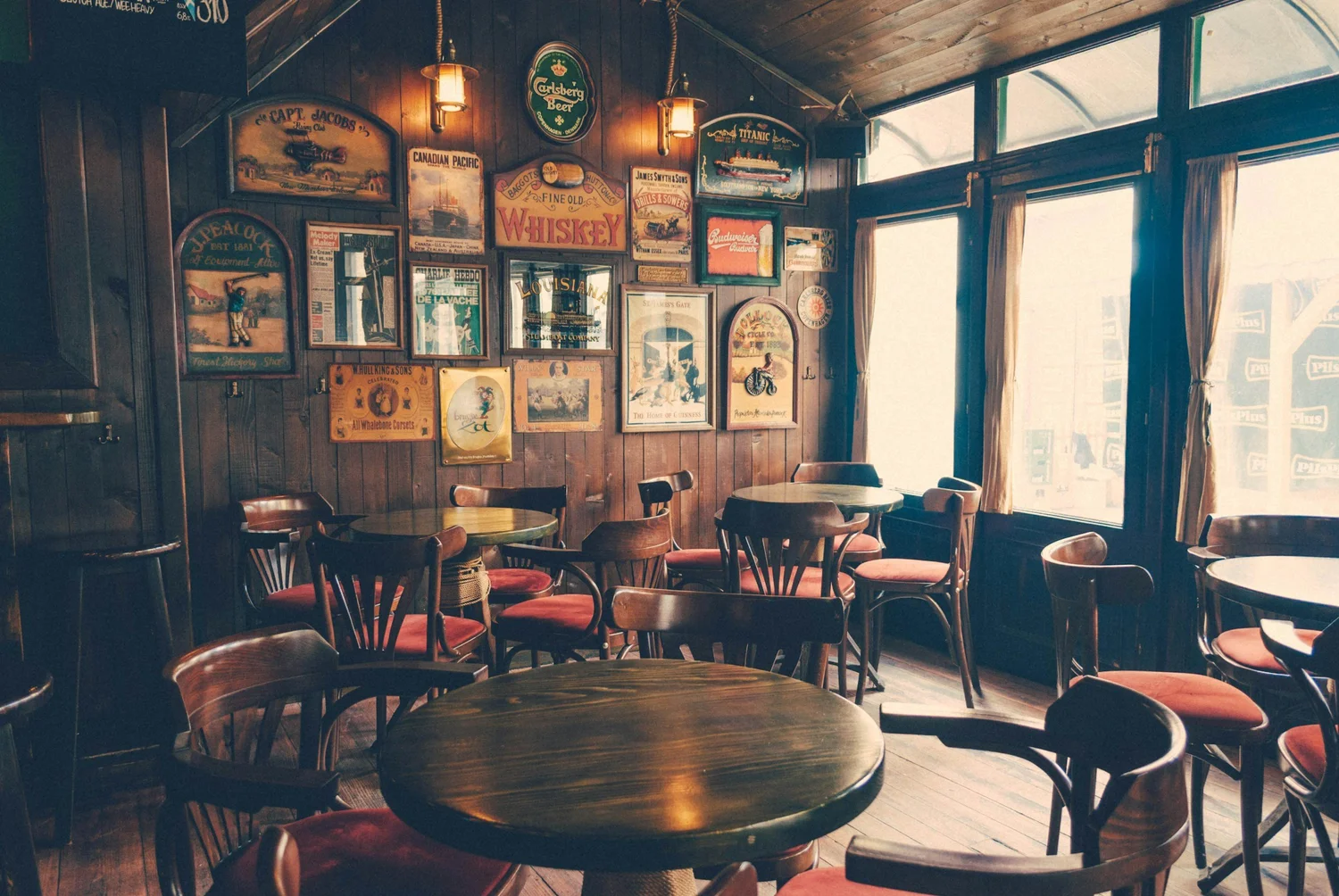Historic London pub interior with polished brass