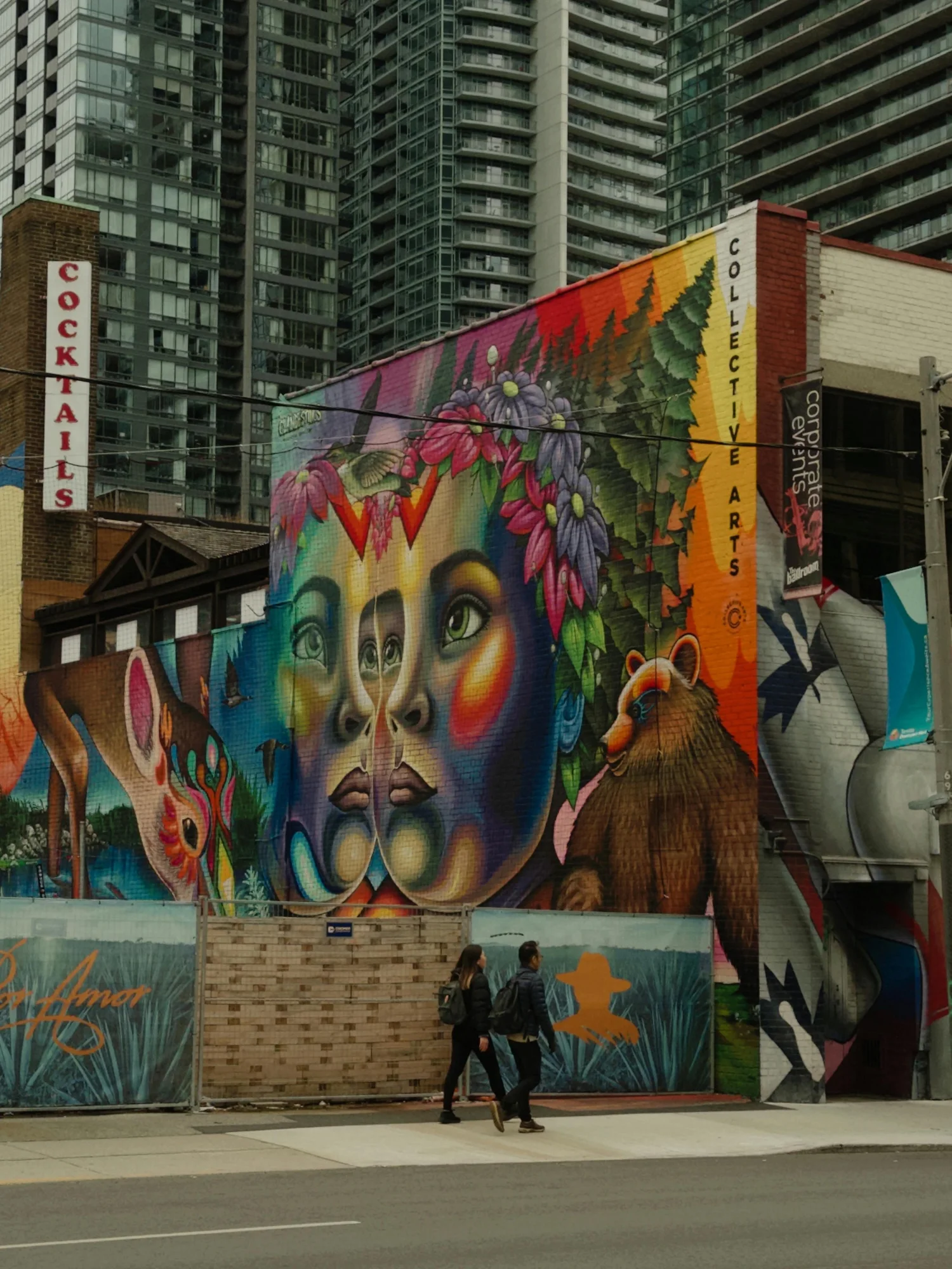 A bold street art mural in a Toronto laneway