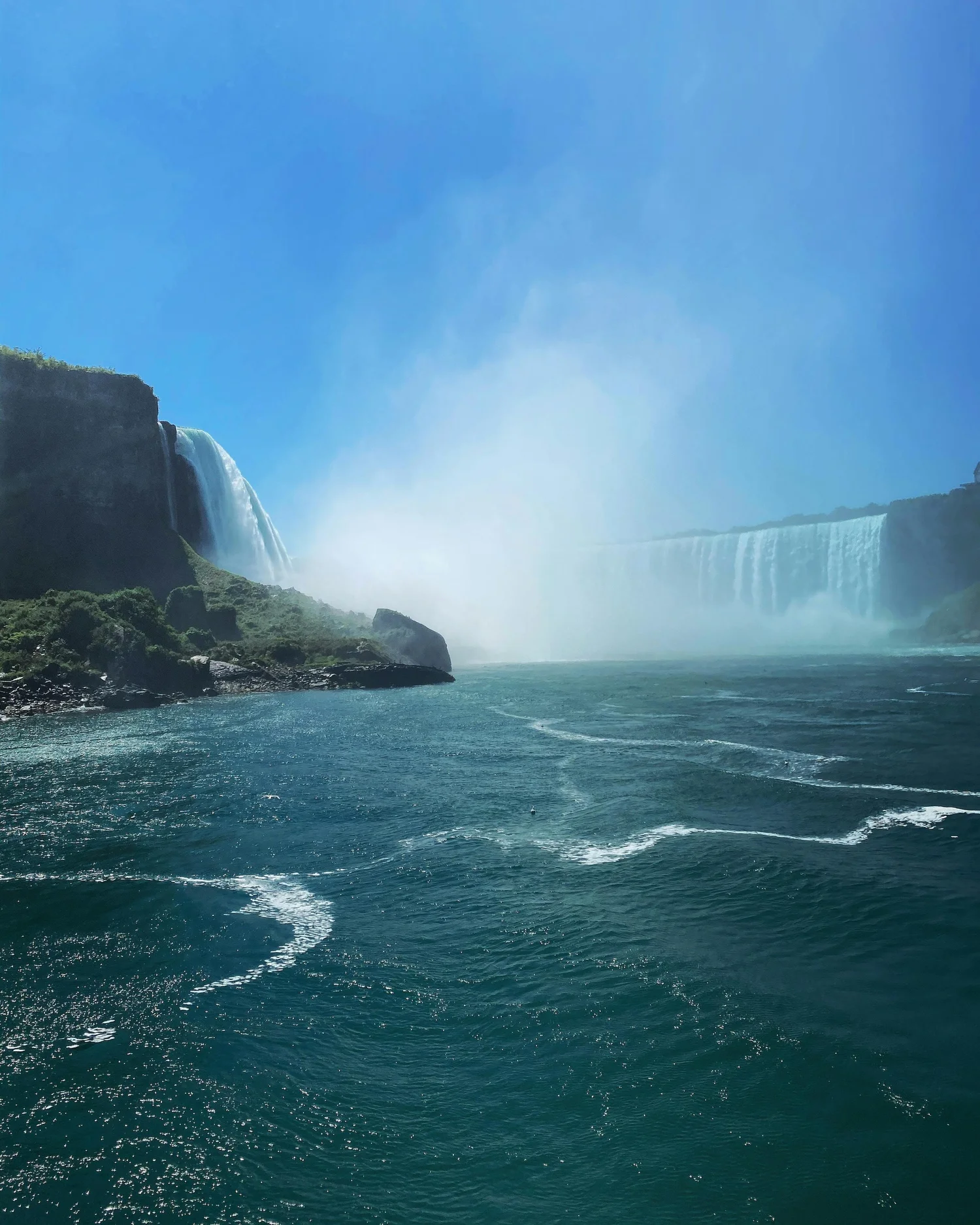 Niagara Falls thundering beneath a wide sky