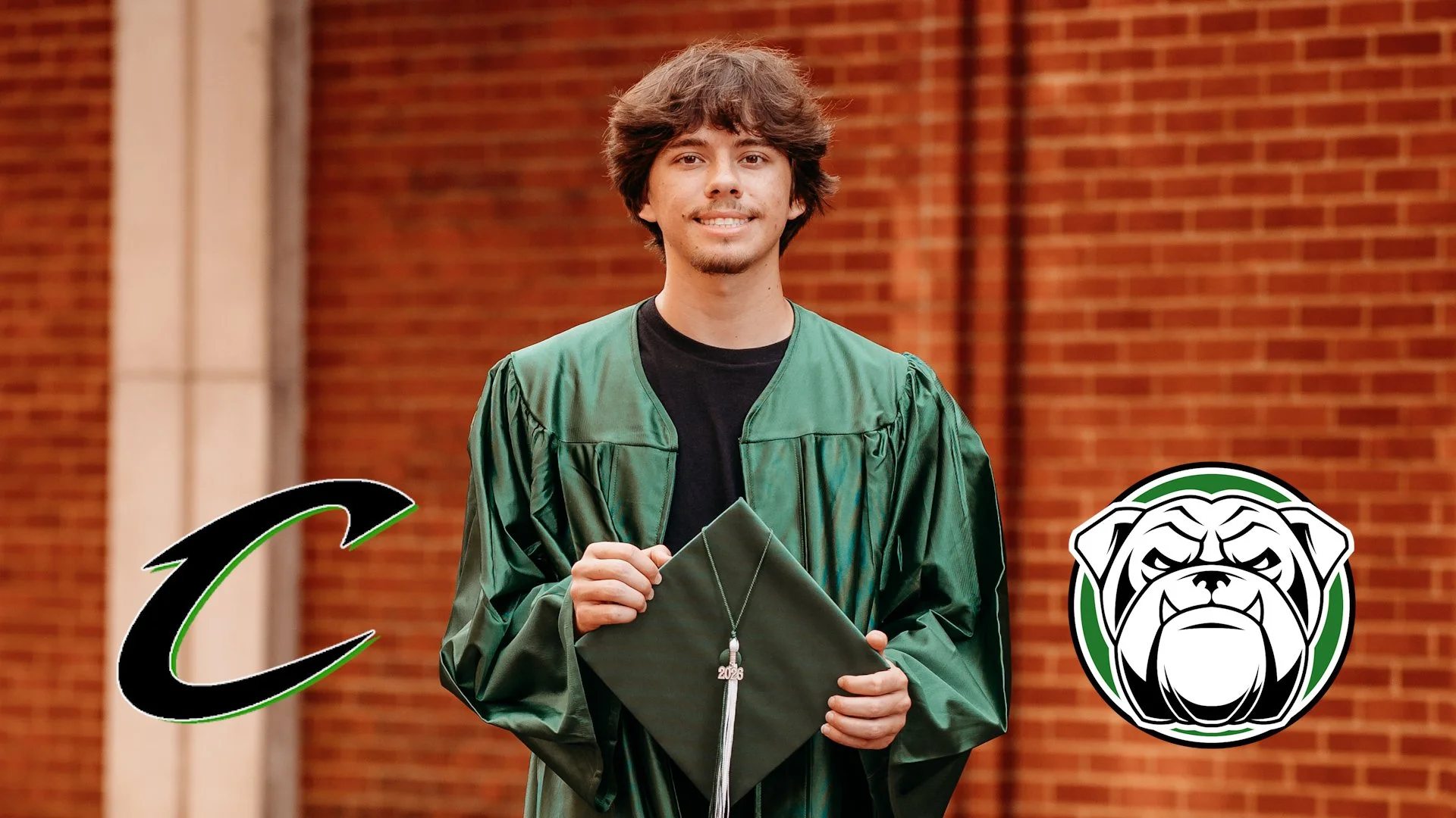 Kyler Allen in his Central High School graduation gown holding his cap in Pollok Texas 2026