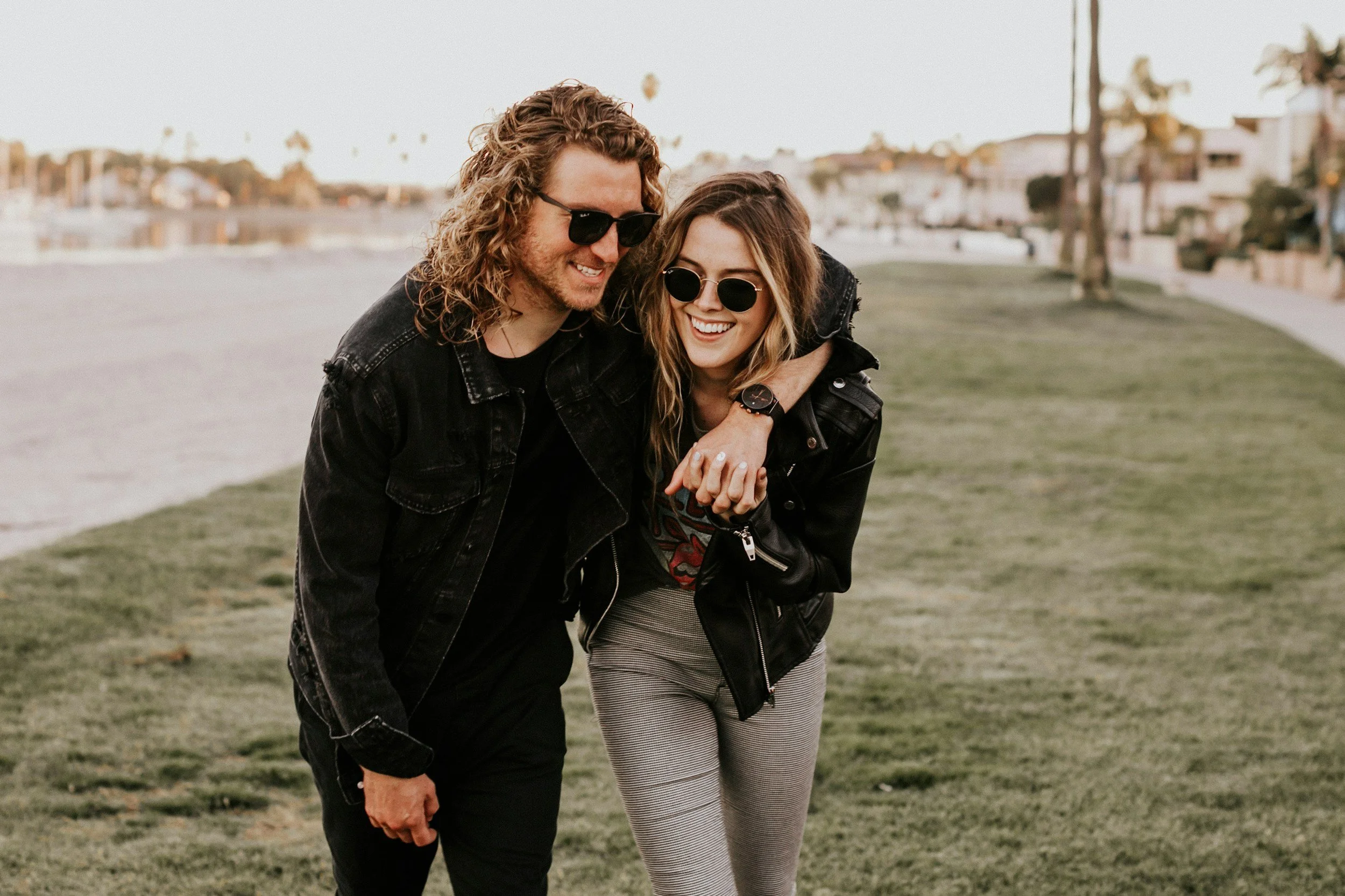 couple smiling and holding hands