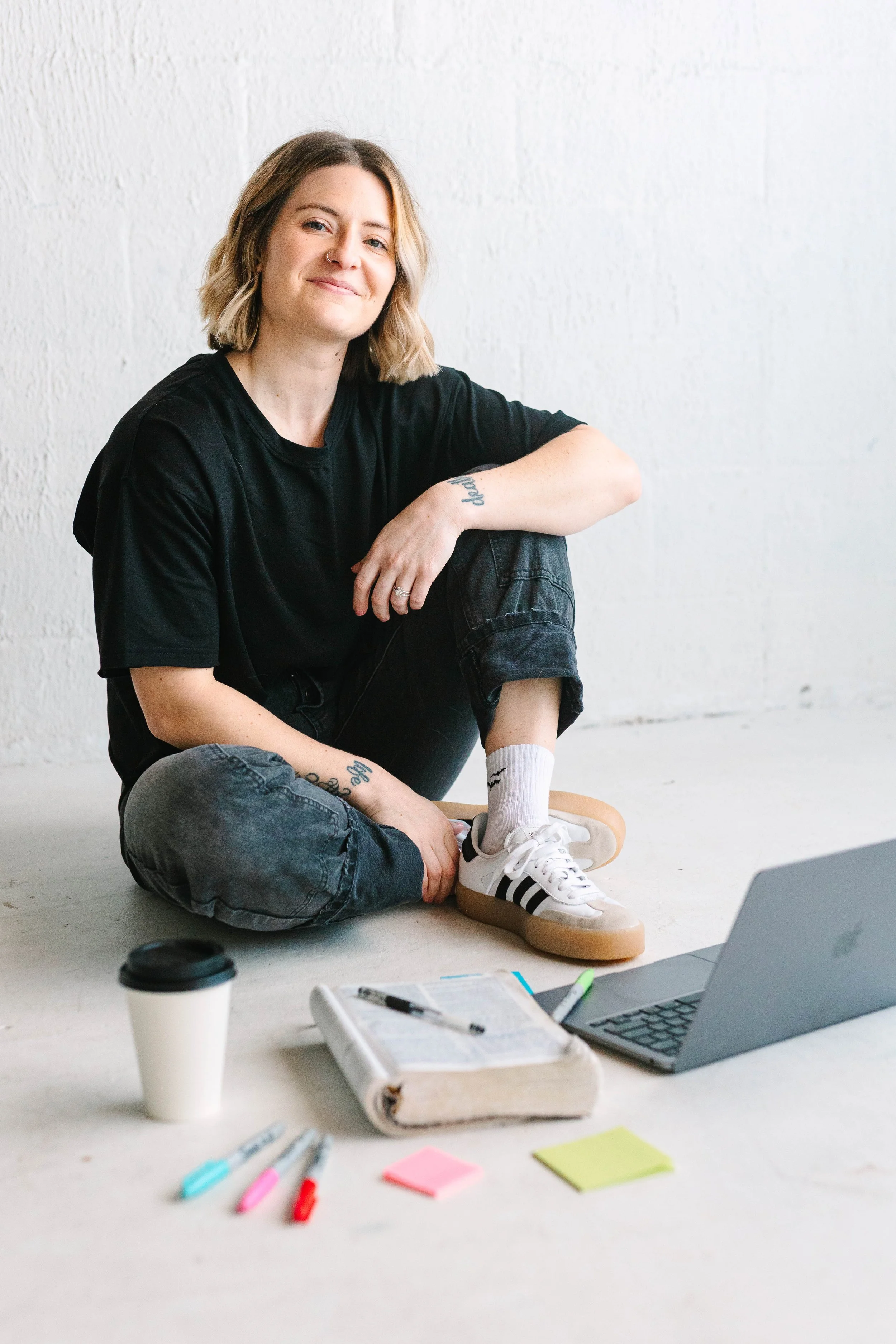 kaley hollingsworth with her computer and bible to offer speaking, writing, and creative services