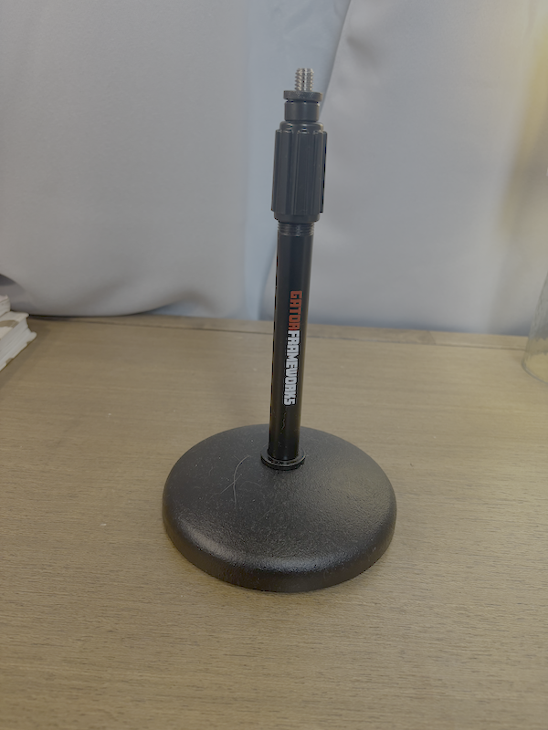black podcast microphone table top stand