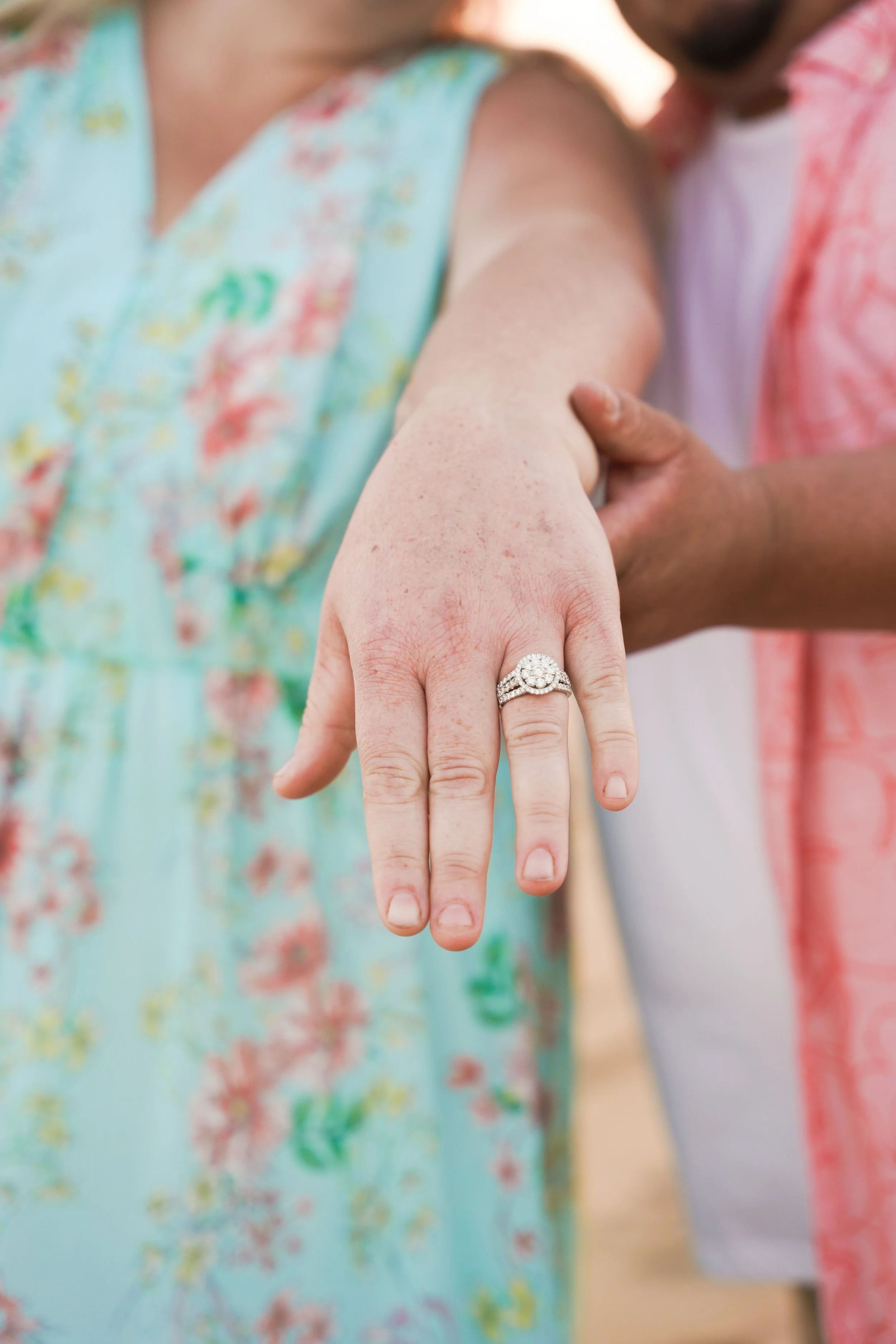 Sunset proposal at Balboa Pier in Newport Beach, California, with emotional engagement photos captured by undercover package session.