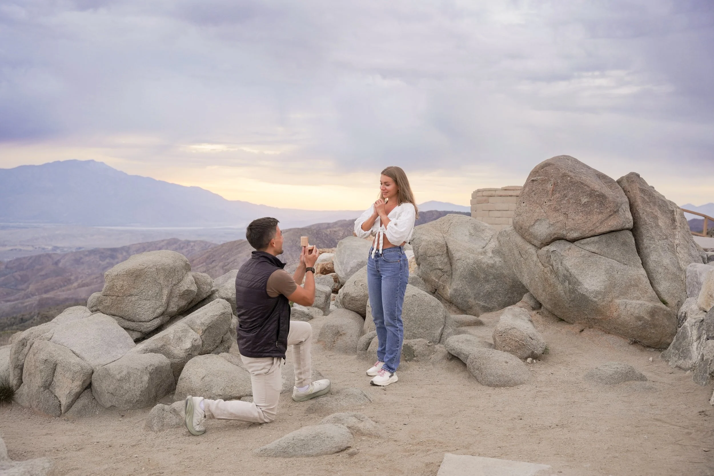 Joshua Tree surprise proposal at Keys View during golden hour overlooking Coachella Valley.