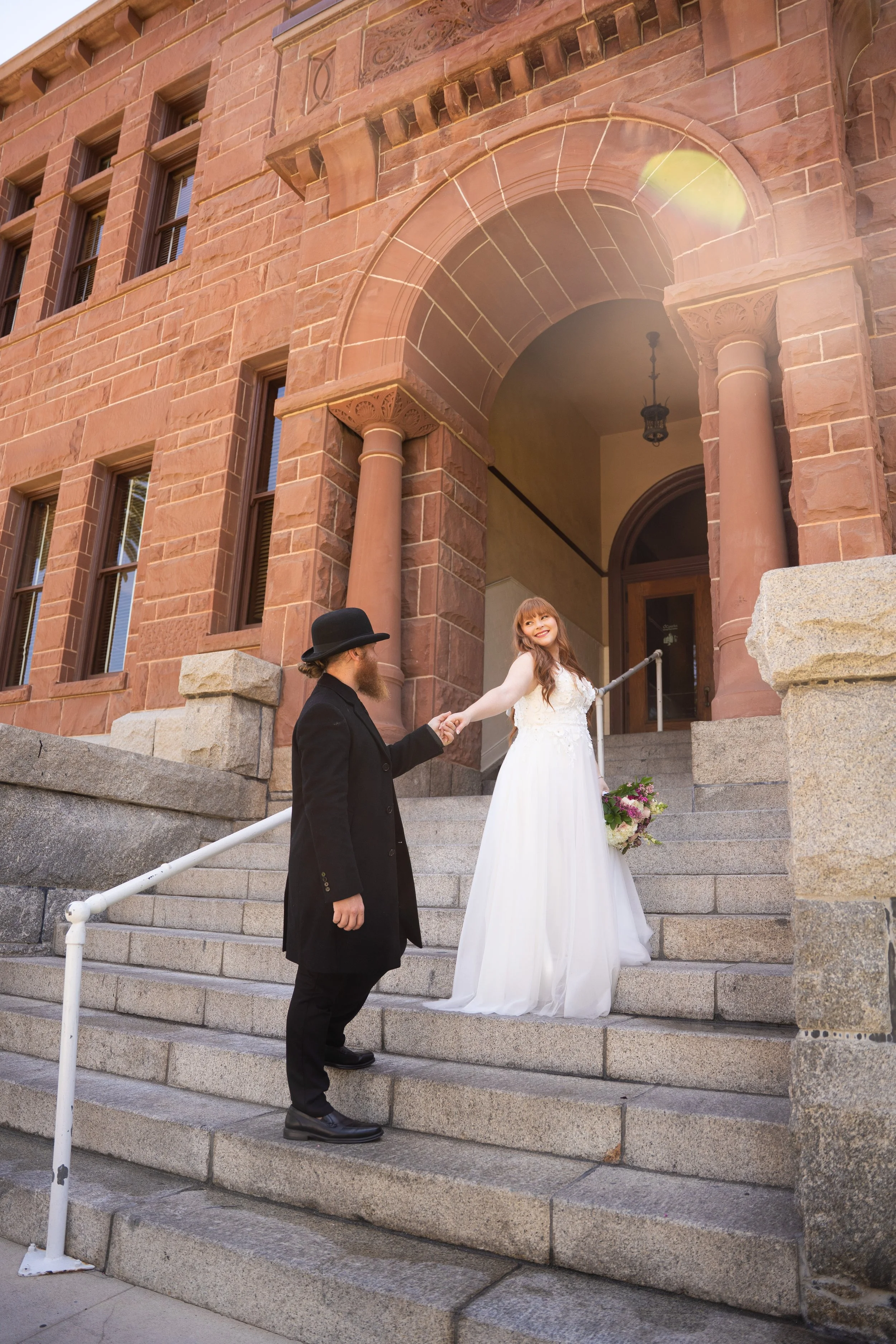 Courthouse wedding photography in Orange County at the historic Santa Ana Courthouse — book your photographer today .