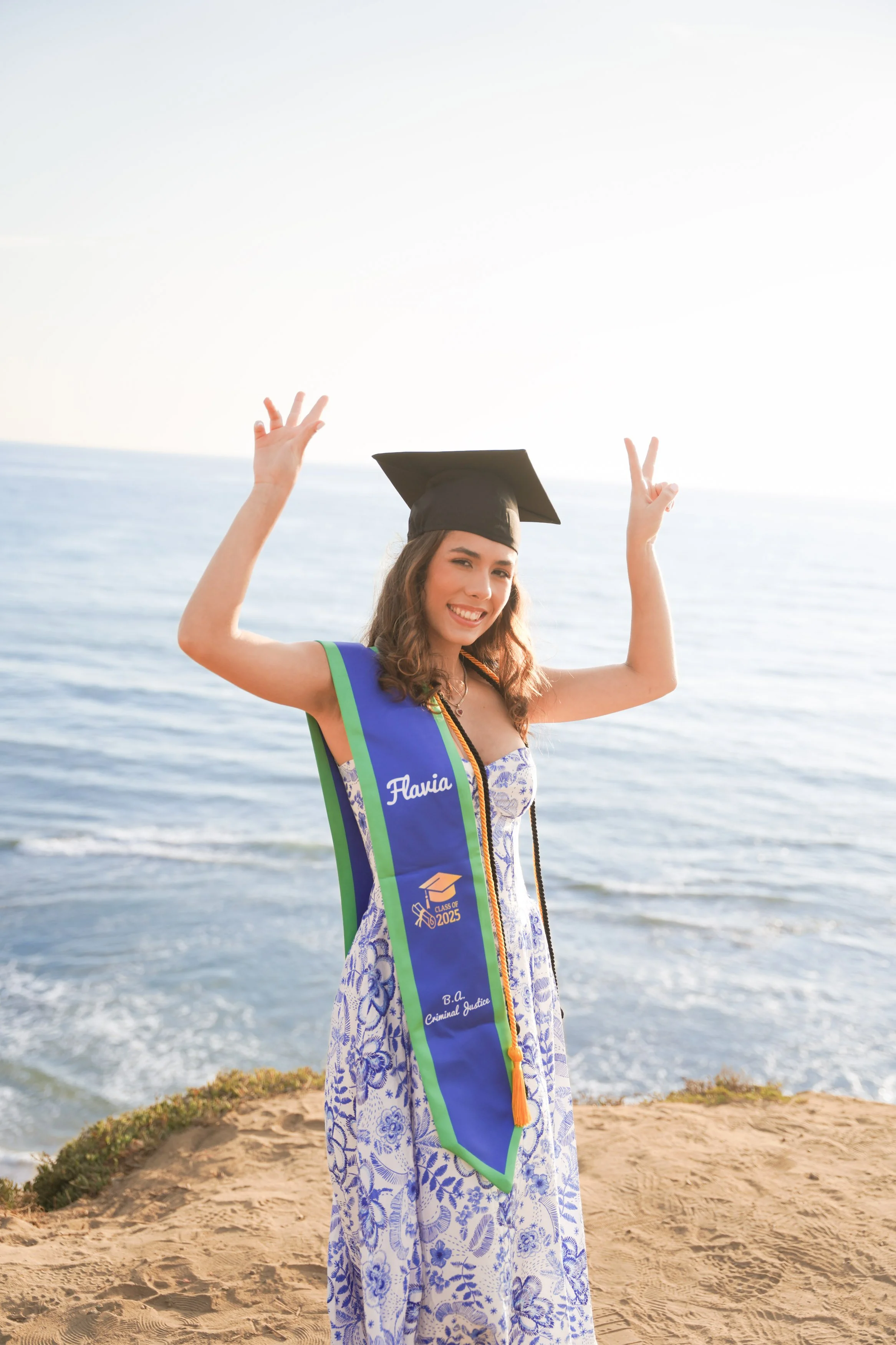 Professional San Diego graduation photography at Sunset Cliffs, capturing golden hour portraits that celebrate your milestone with cinematic beauty and lasting impact.