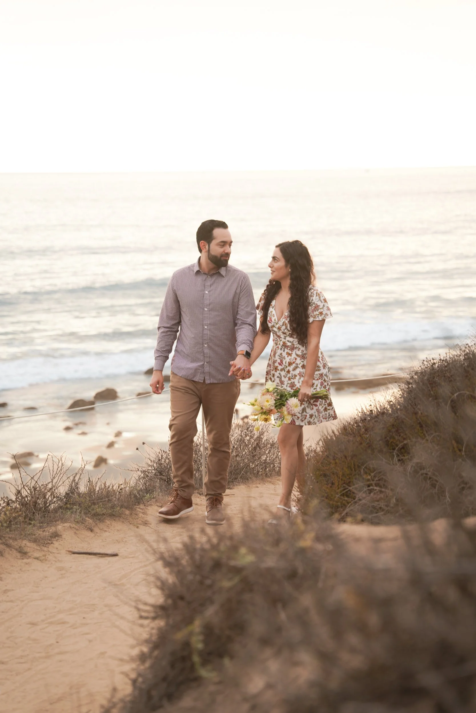 Surprise proposal photography at Crystal Cove State Park in Newport Beach — book your unforgettable moment today.
