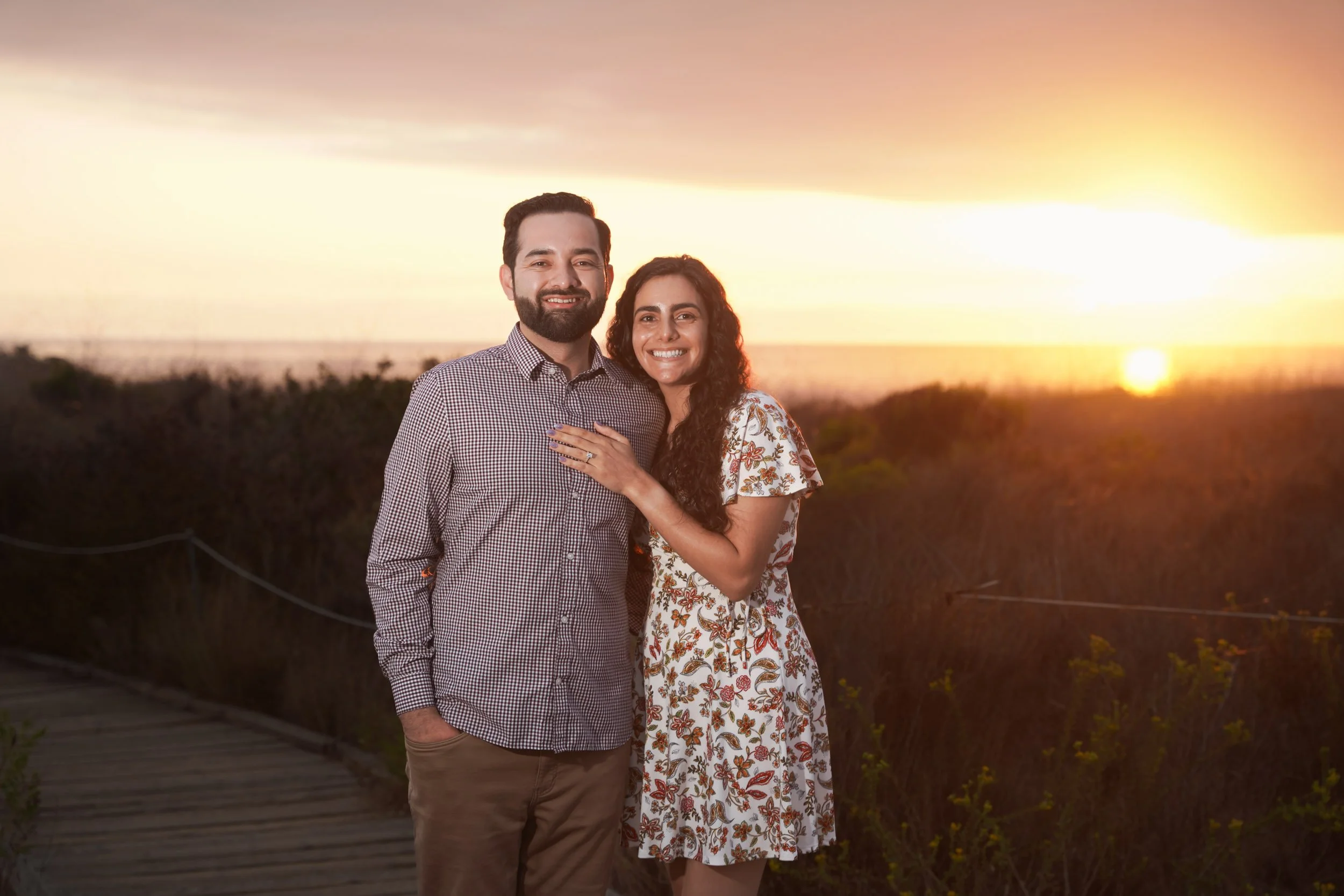 Sunset proposal photography at Crystal Cove cliffs — secure your Newport Beach photographer for the perfect “yes.”
