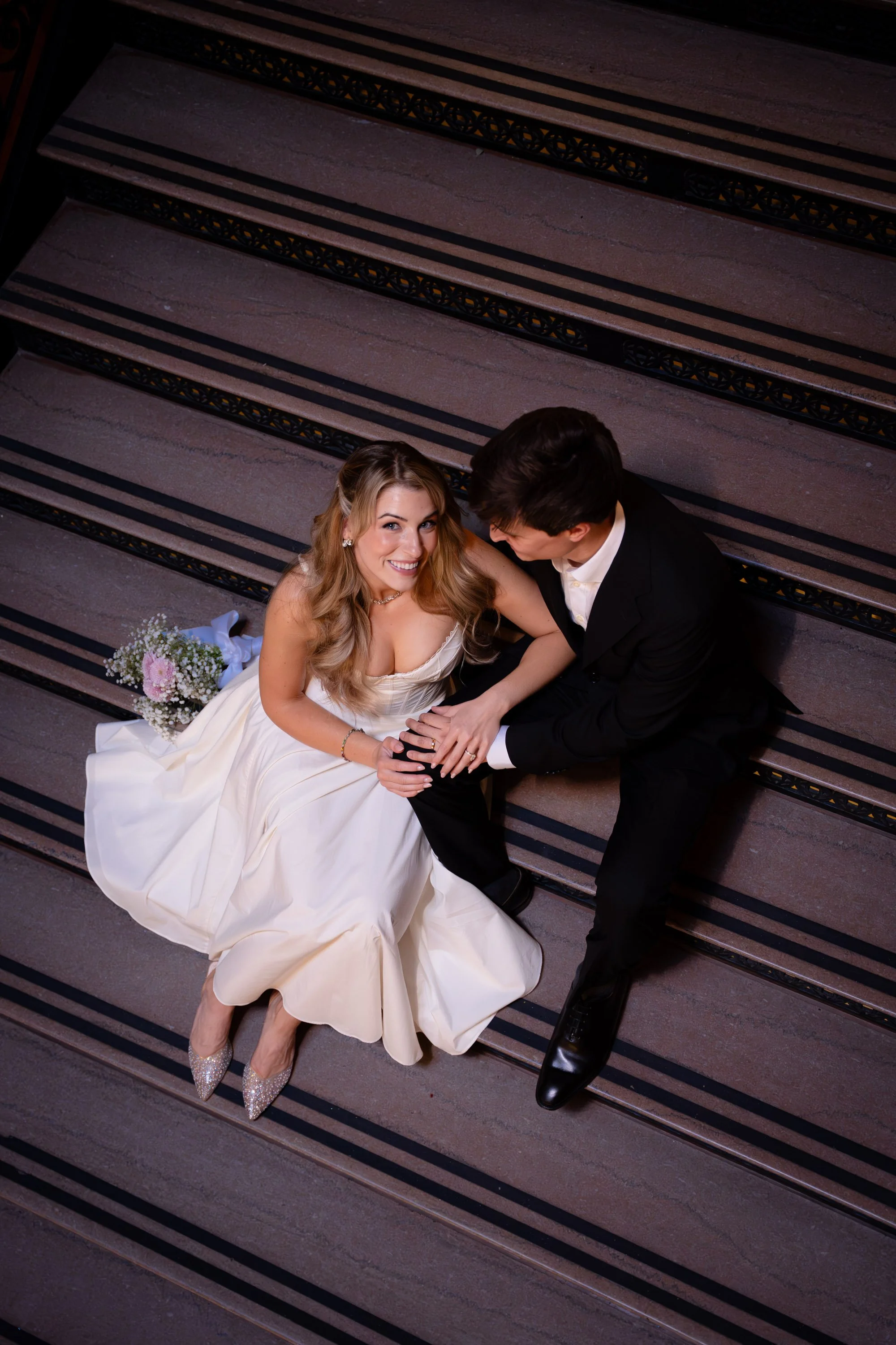 Quiet Moment on Stairway During Courthouse Wedding