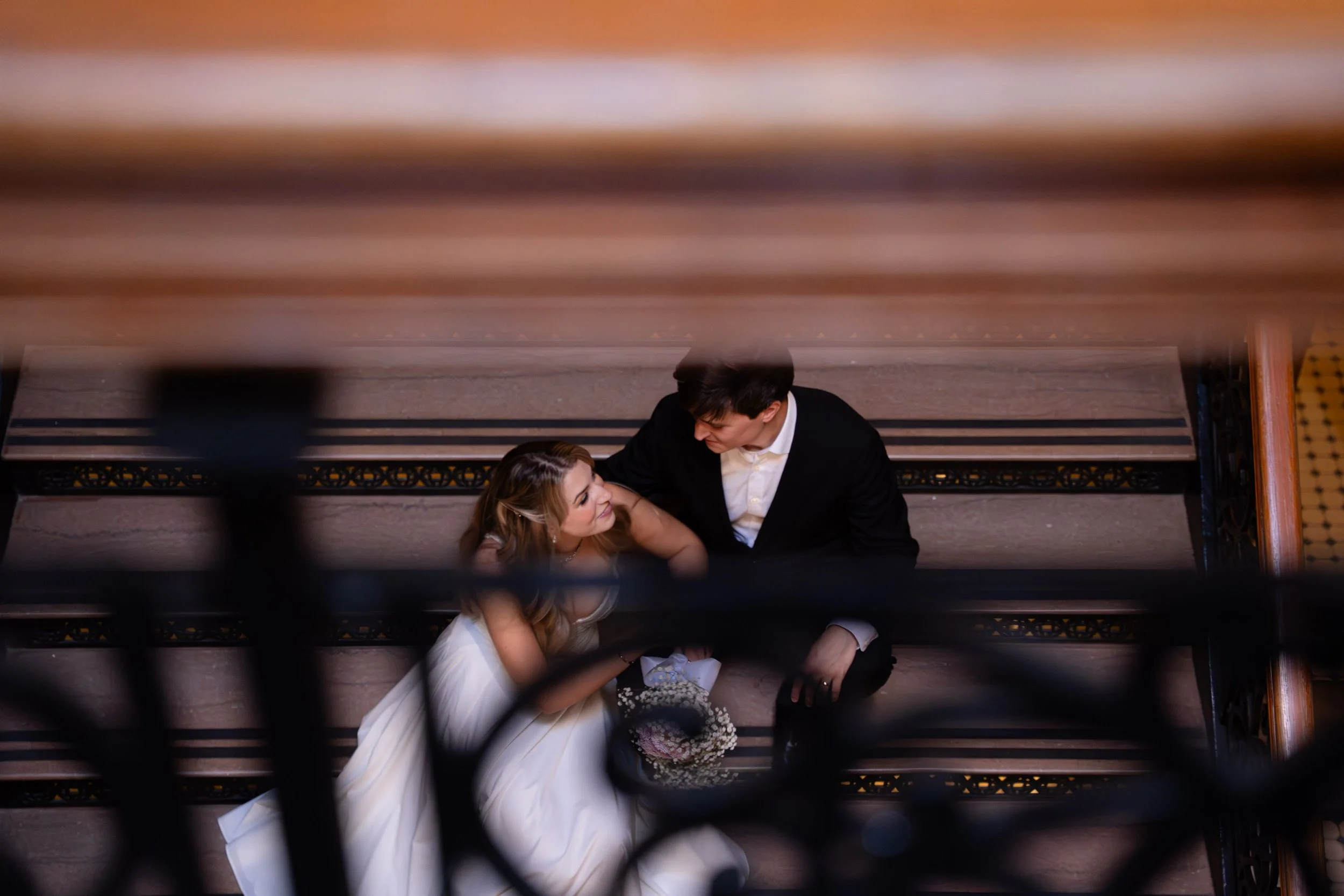 Editorial Portrait on Second Floor Balcony Railing