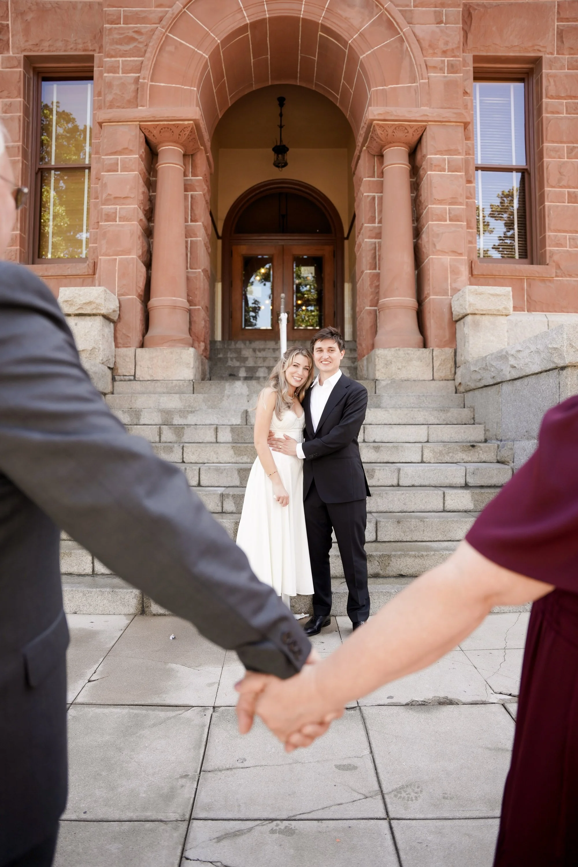 Intimate Moment Before Courthouse Wedding Ceremony