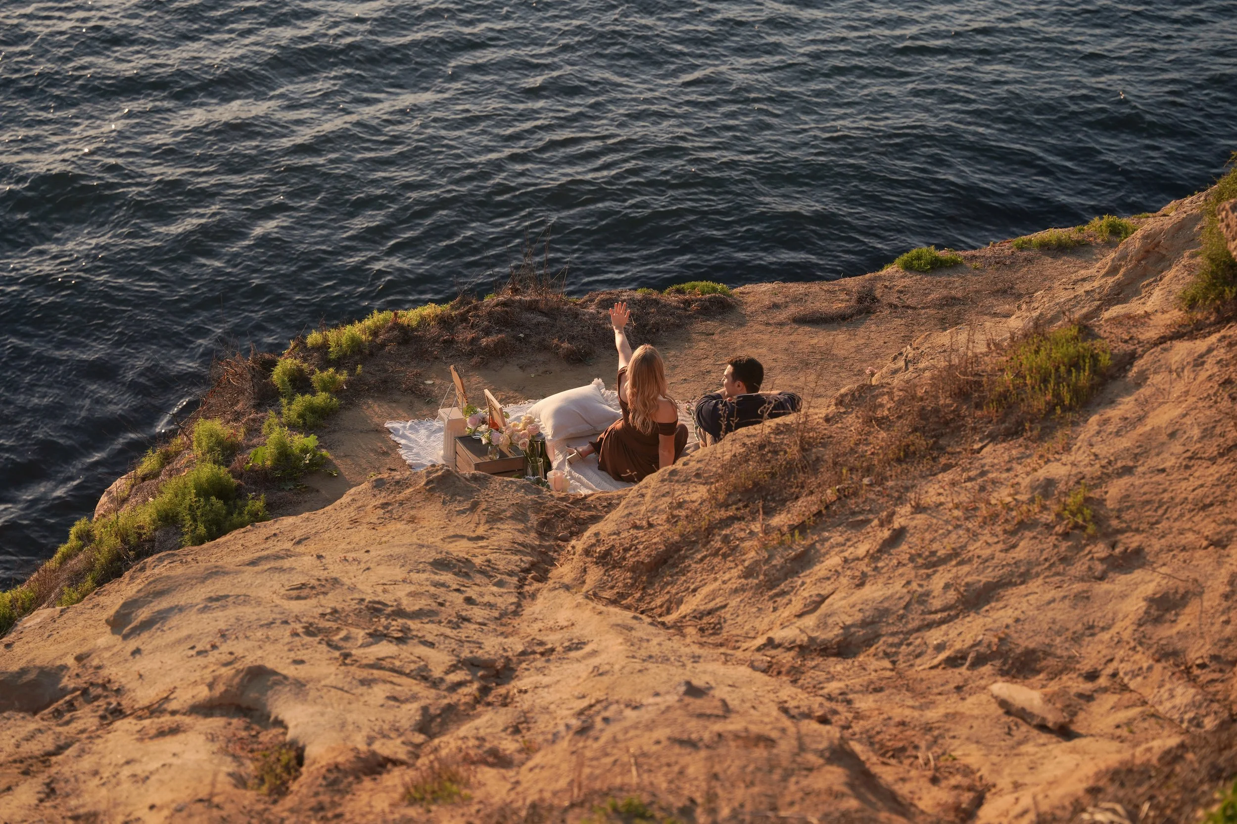 Golden hour engagement photography at the beach