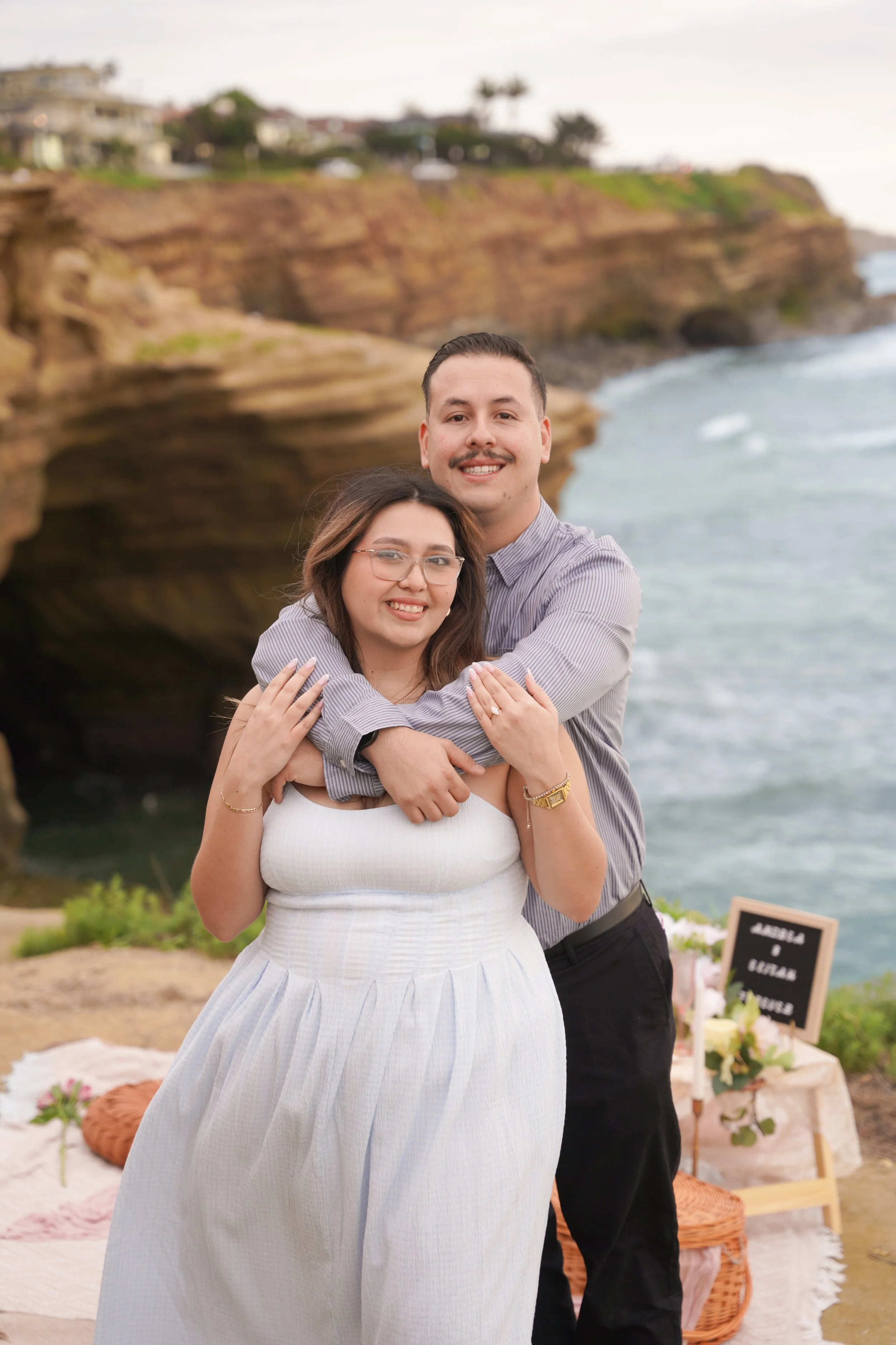 Cliffside Boho Picnic Proposal Setup at Sunset Cliffs