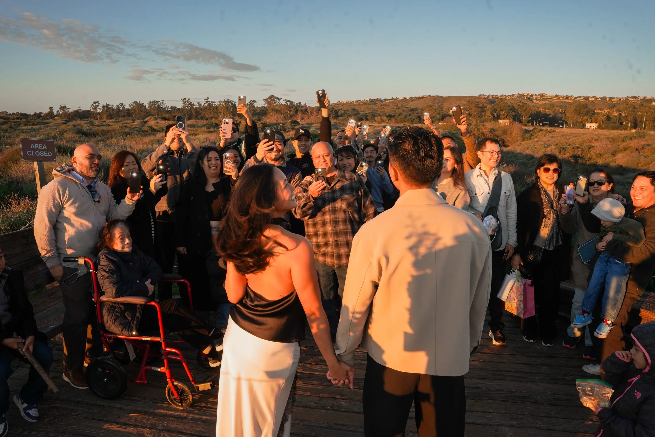 Family Celebrates Surprise Proposal at Newport Beach Sunset