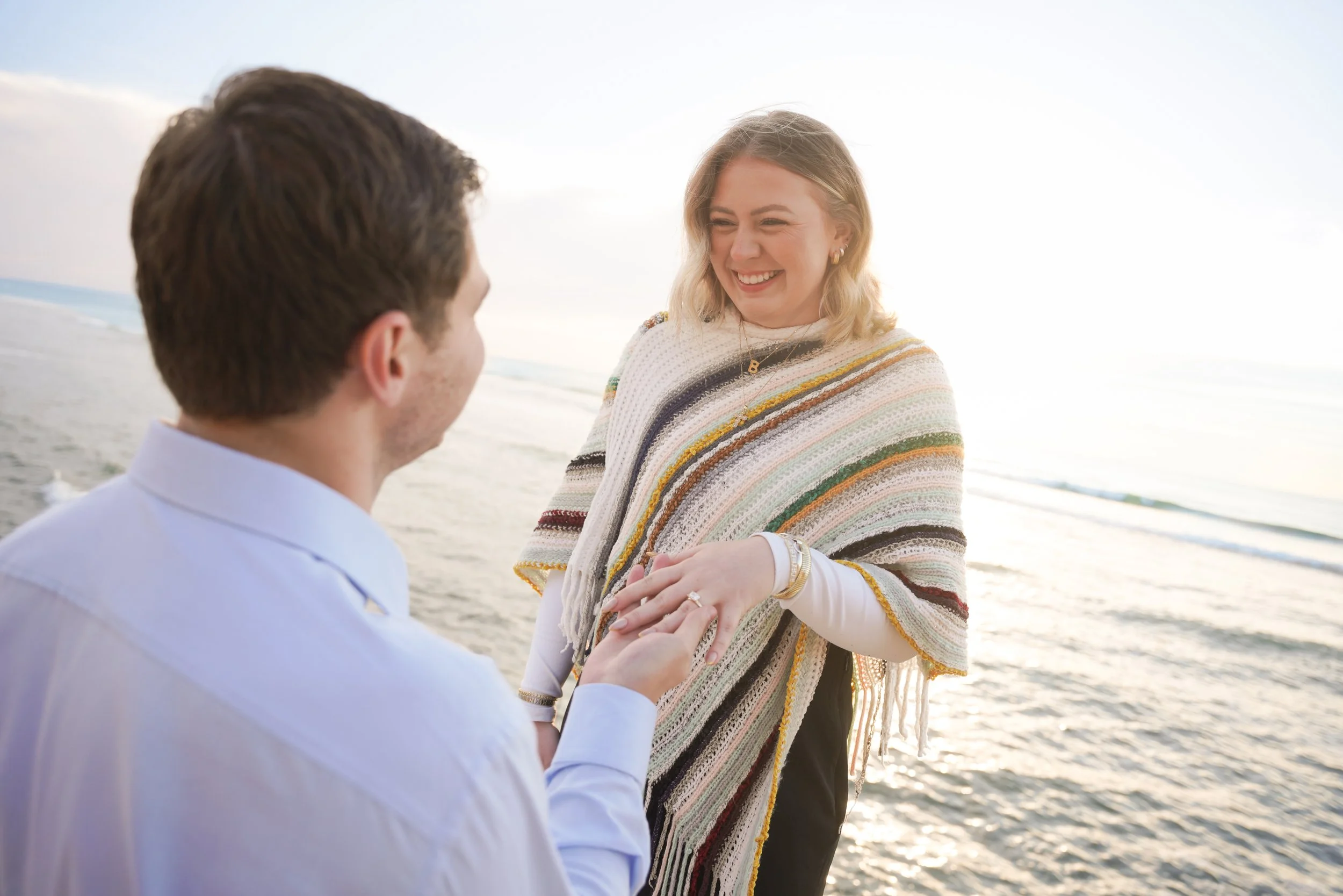 Destination Surprise Proposal Photography at Sunset Cliffs