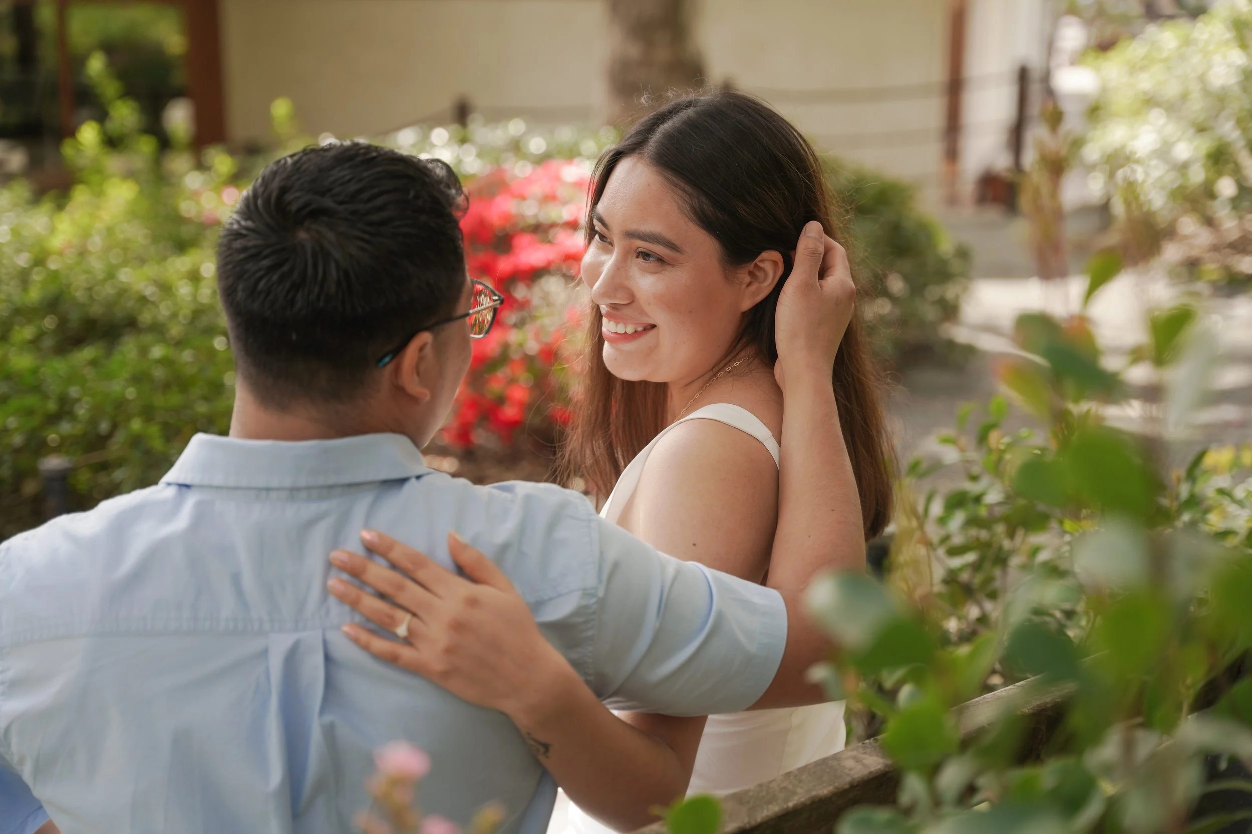 Couple Celebrating Engagement Near Koi Pond at Japanese Friendship Garden San Diego