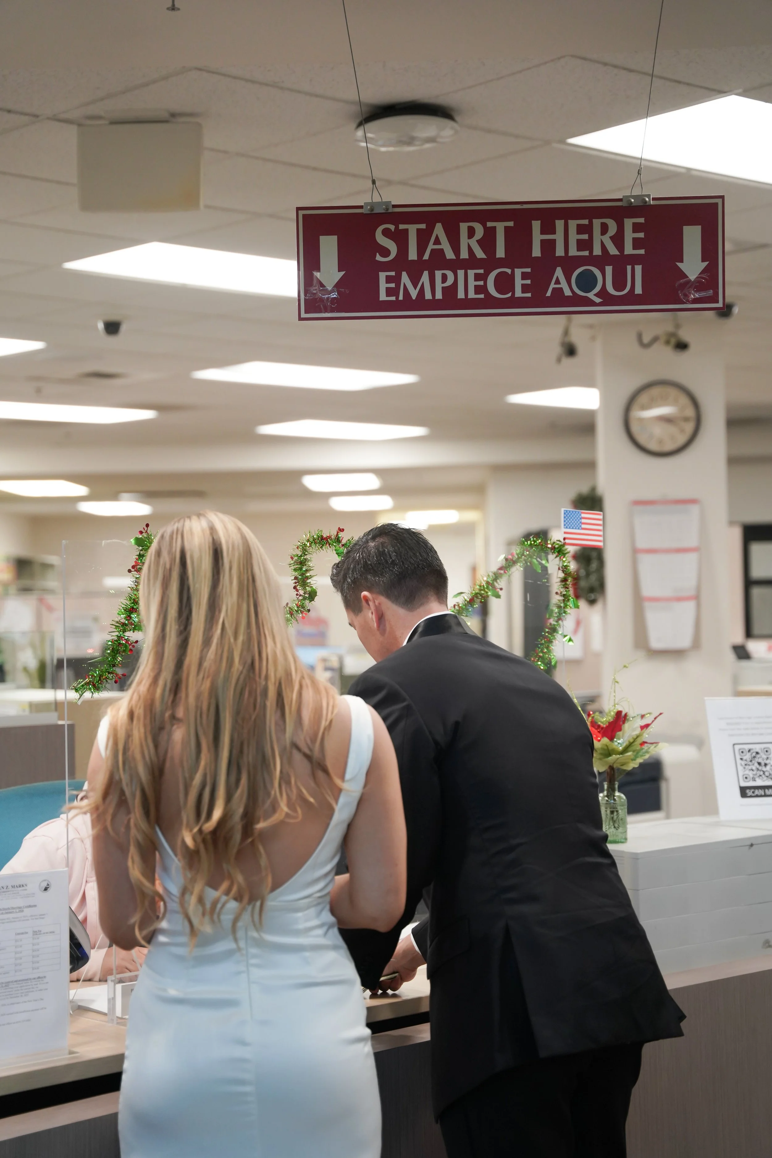 Couple Checking In for Their San Diego Courthouse Wedding Ceremony