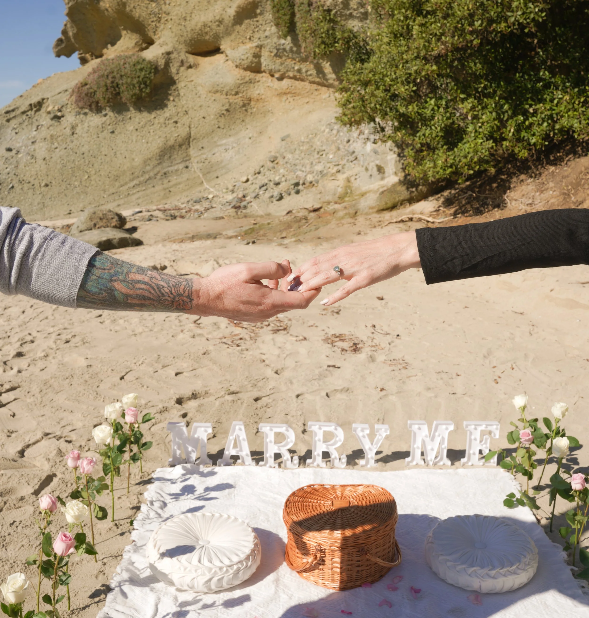 Couple Enjoying Beach Picnic After Surprise Proposal in Laguna Beach