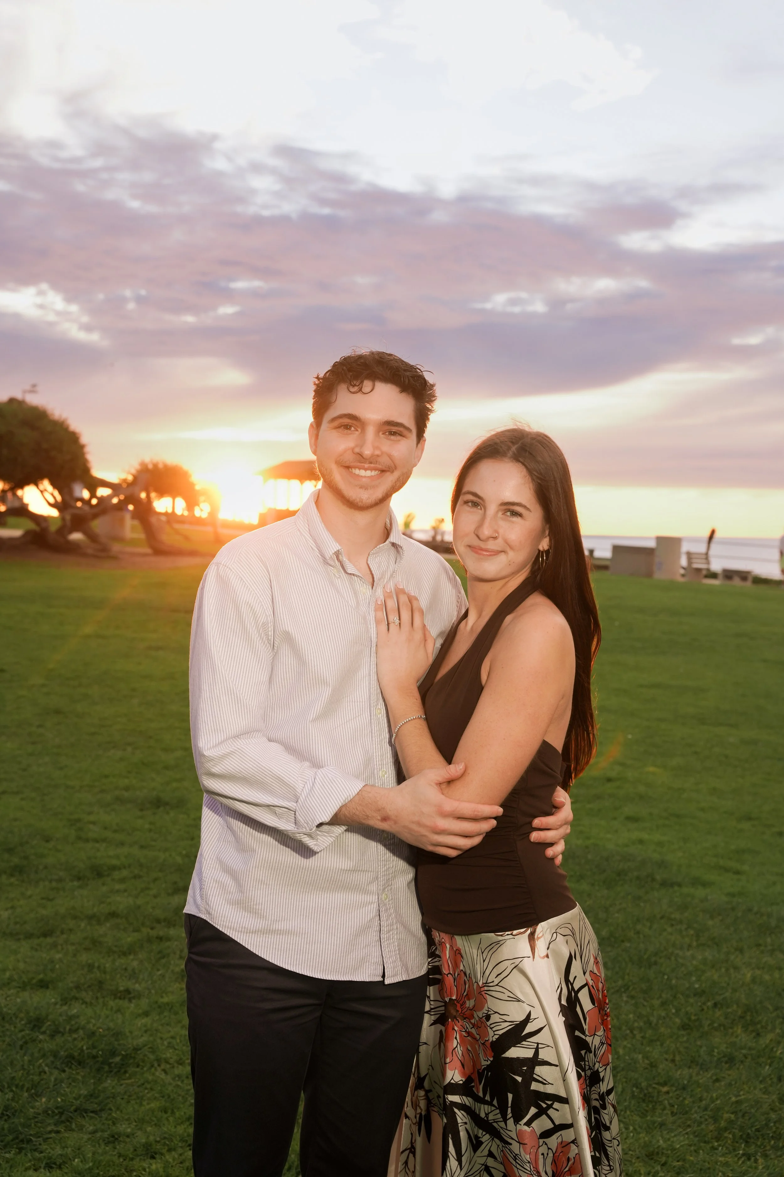 Couple Admiring Engagement Ring After La Jolla Proposal