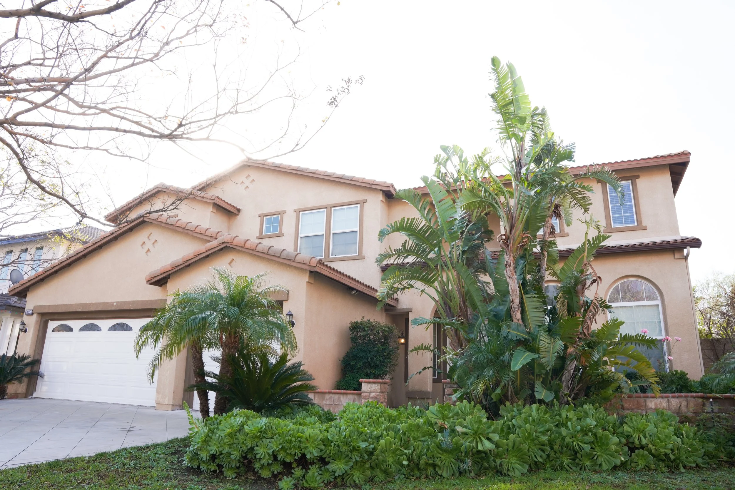 Exterior shot of a 4000 sq ft home captured during an overcast morning.