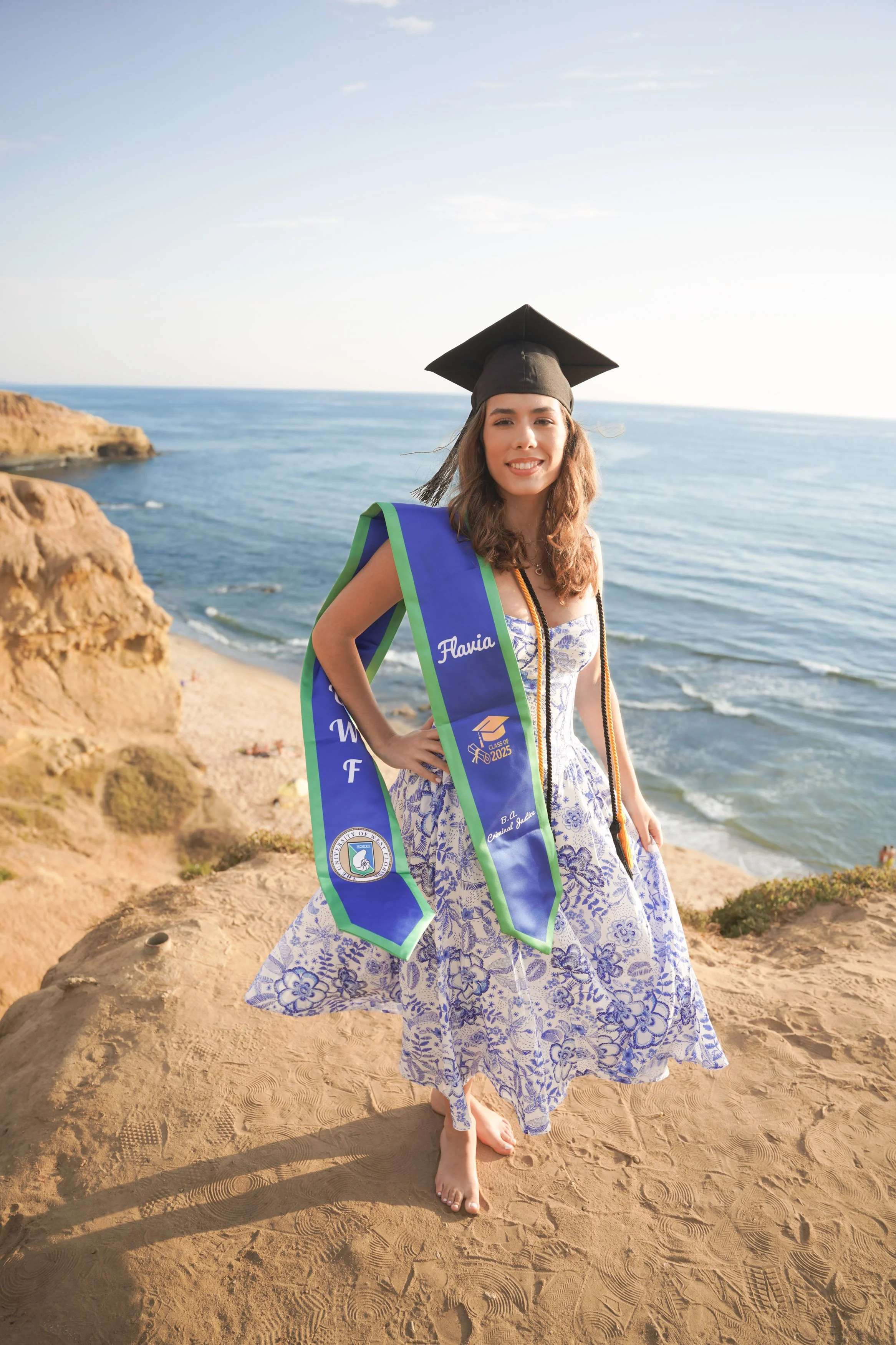 San Diego graduation photoshoot at Sunset Cliffs during golden hour, designed to deliver professional milestone photography with timeless oceanfront views.