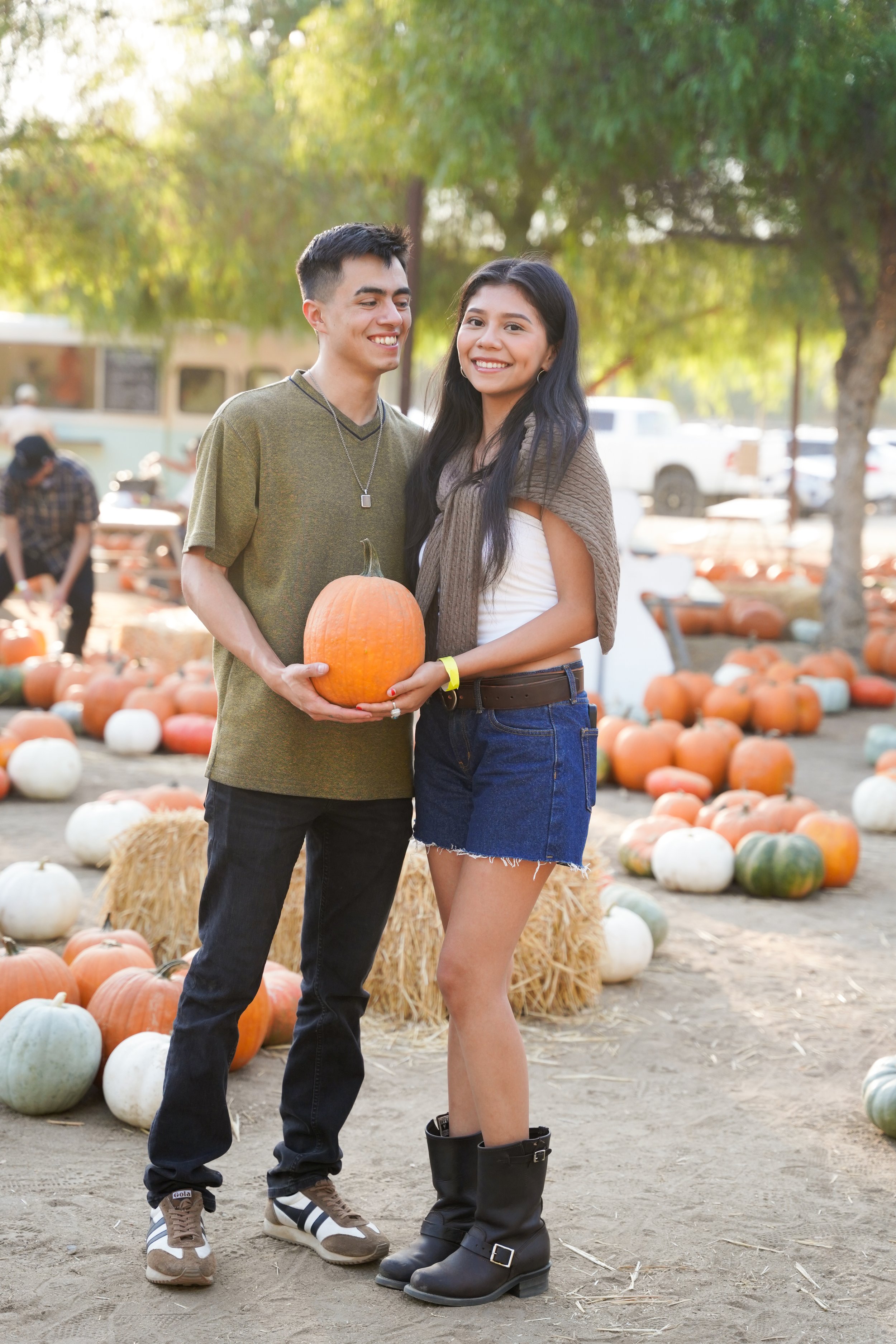 Love in full bloom at the pumpkin patch in Temecula! This cozy couples portrait session captured sweet moments, autumn colors, and seasonal charm—perfect for celebrating love in Southern California’s fall sunshine.