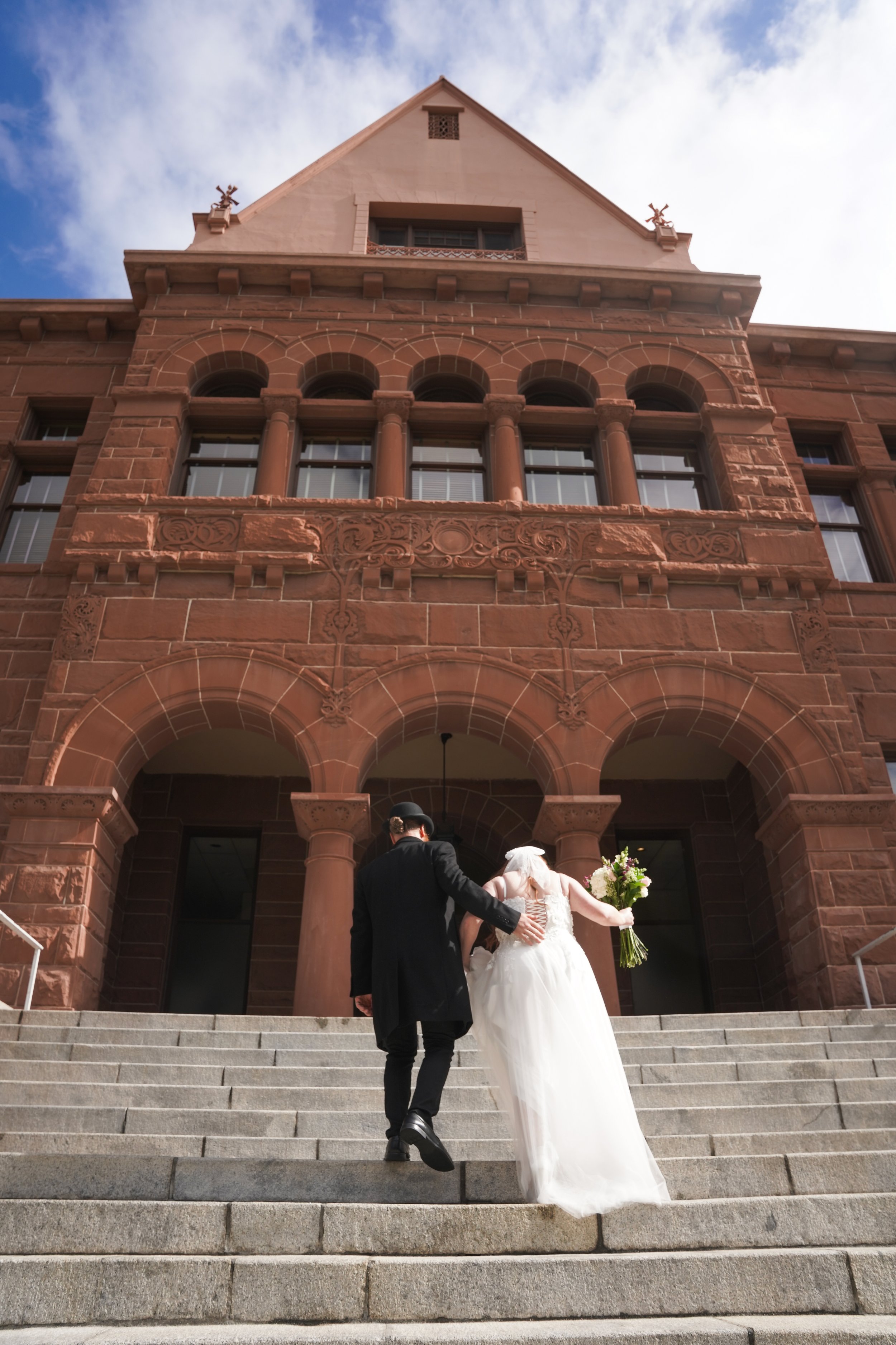 Beautiful, timeless moments captured of Joshua & Colleen at the historic OC Courthouse in Santa Ana. Civil courthouse wedding photography that tells your story—book us today.