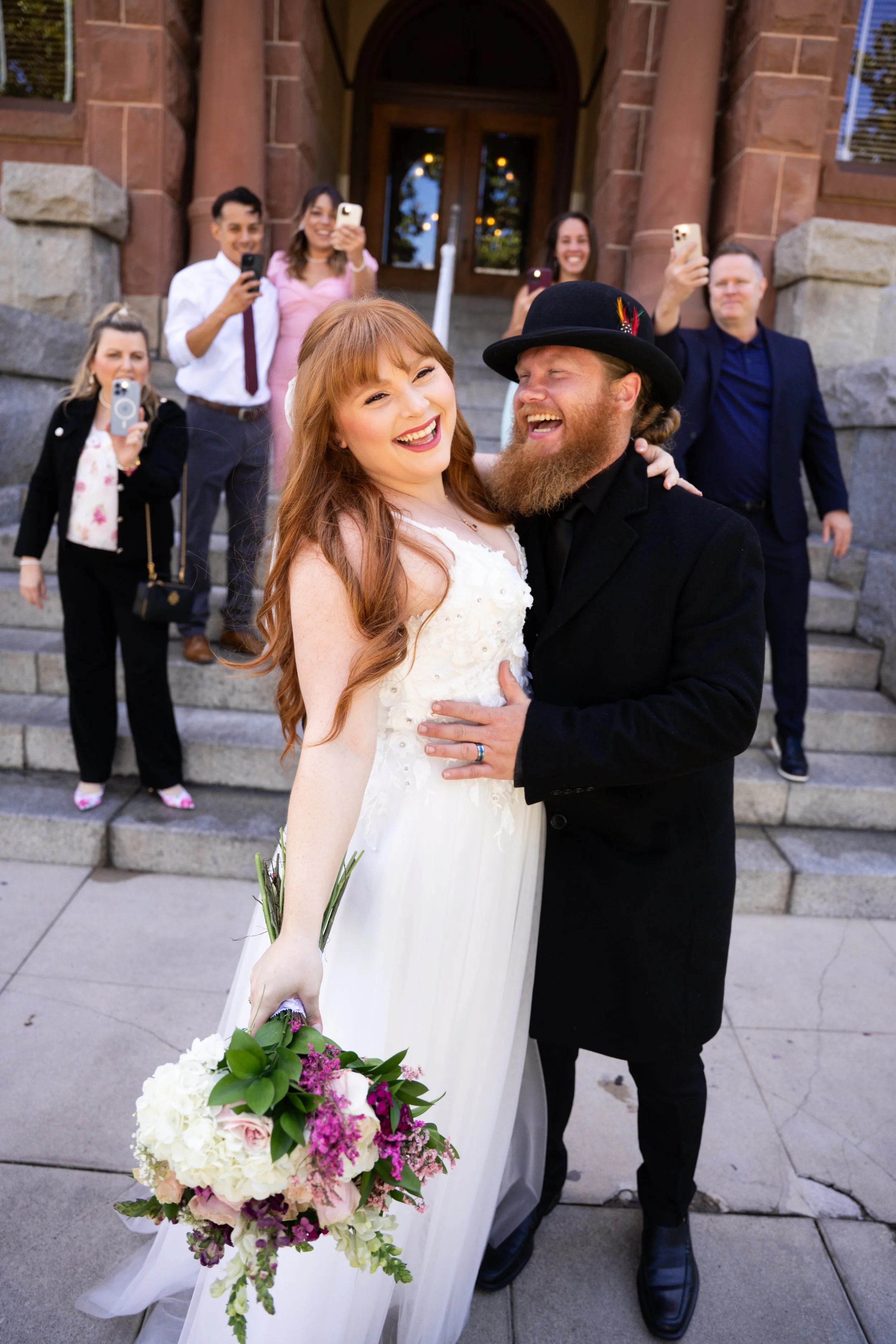 Beautiful, timeless moments captured of Joshua & Colleen at the historic OC Courthouse in Santa Ana. Civil courthouse wedding photography that tells your story—book us today.