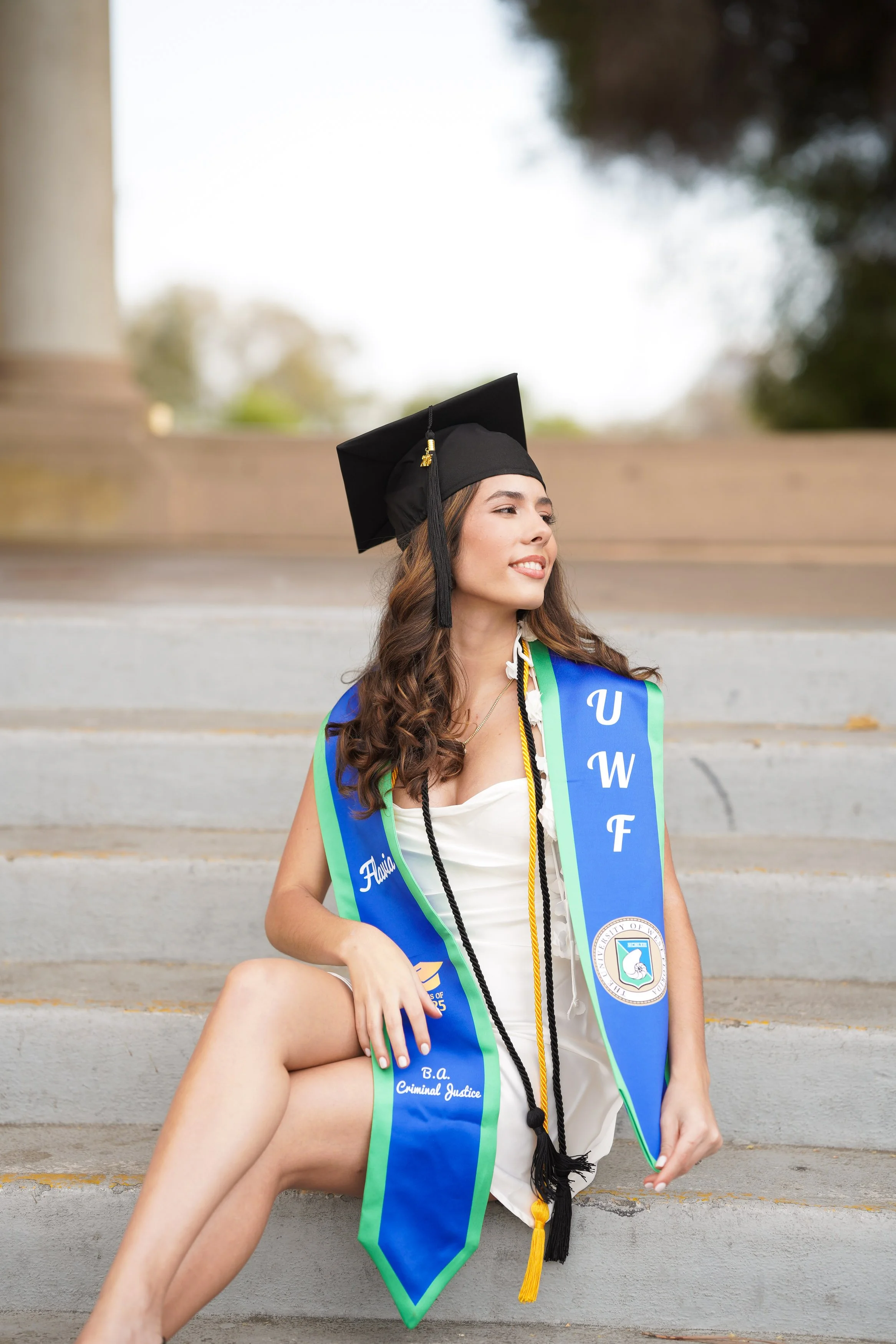 San Diego milestone graduation session for this University of West Florida graduate, photographed at Balboa Park.