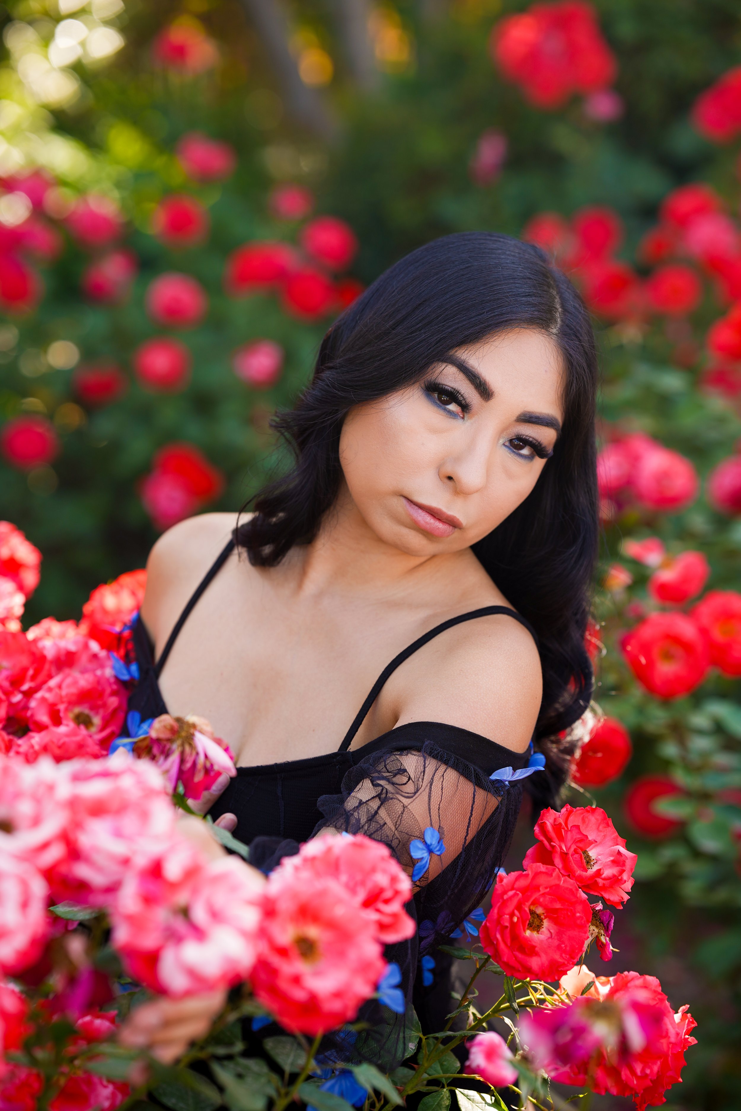 Found the cutest rose-filled spot this spring at Prospect Park in Redlands—so you know we had to shoot it! This sweet portrait photography session was full of color, charm, and golden light. Perfect for dreamy spring portraits in Redlands.
