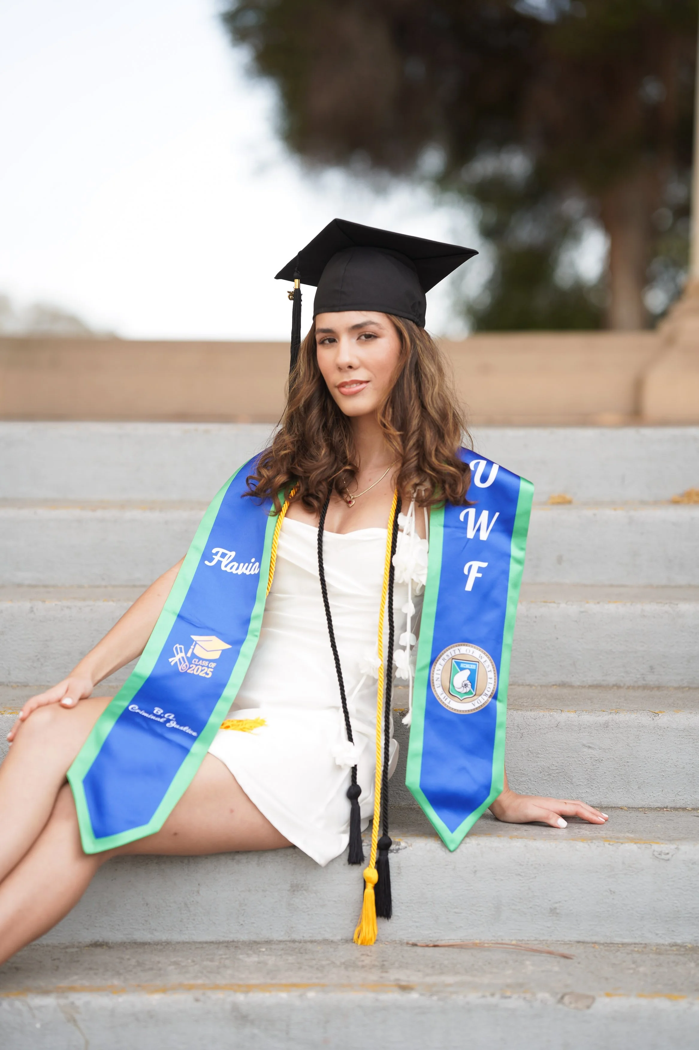 From UWF classrooms to San Diego’s Balboa Park, this graduate celebrated with timeless milestone portraits.