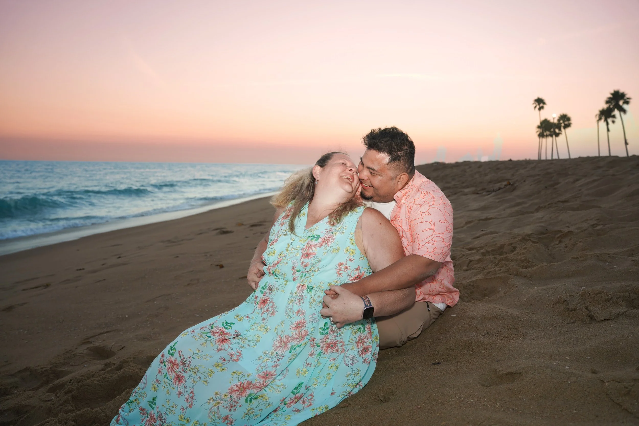 Undercover proposal photography at Balboa Beach Newport, Orange County couple celebrates surprise engagement.