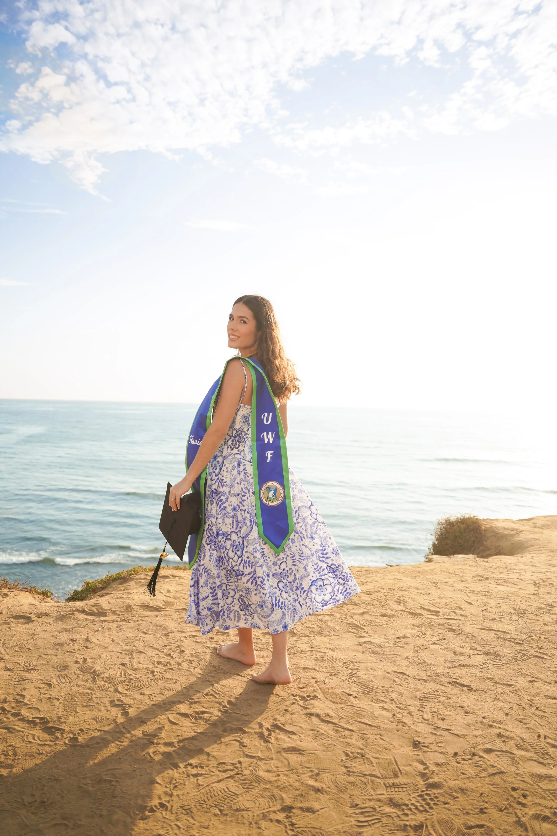 Golden hour milestone portraits captured at Sunset Cliffs, San Diego, by a trusted graduation photographer who specializes in creating unforgettable coastal photography experiences.