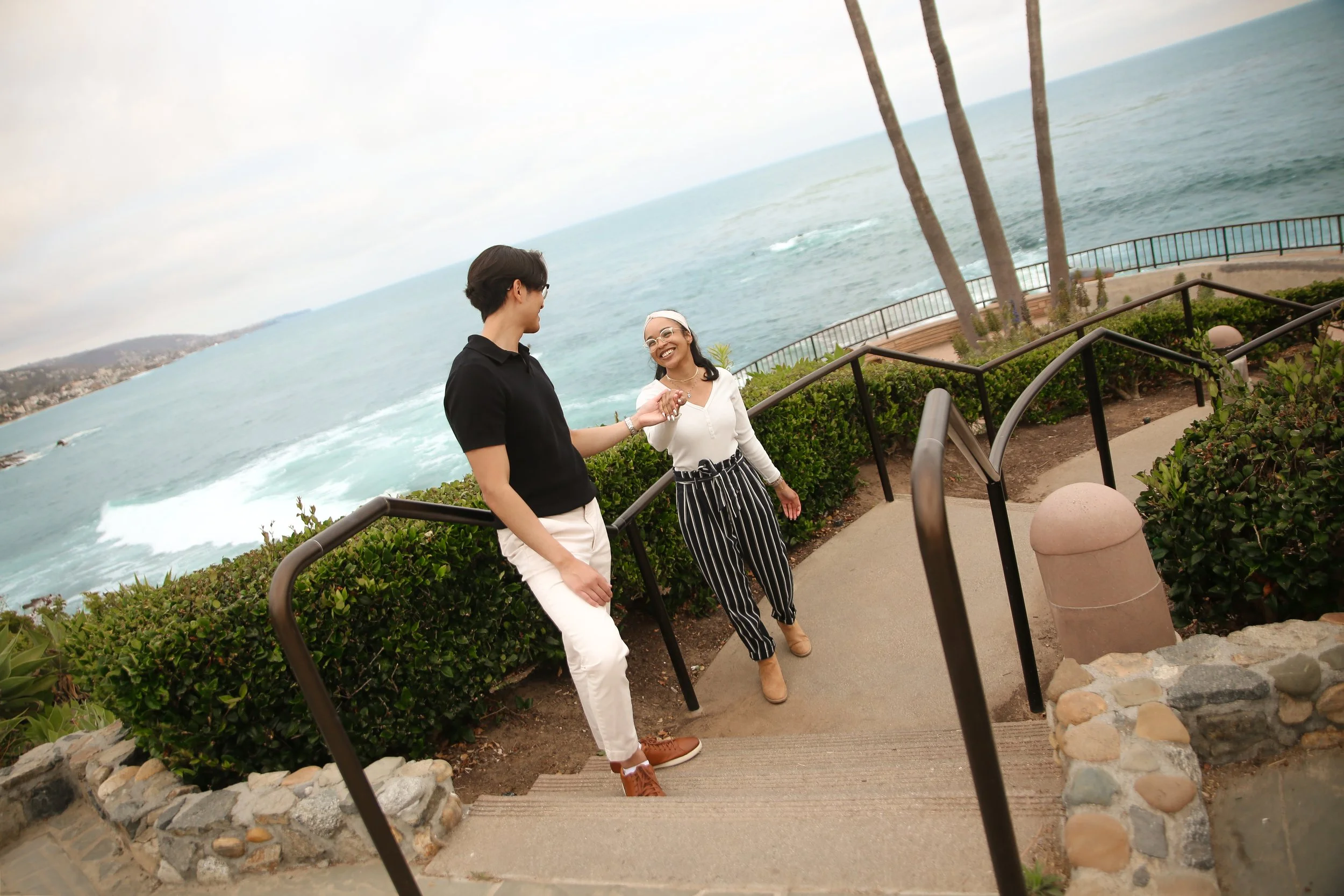 Engagement photo session at Heisler Park in Laguna Beach with natural light and scenic Pacific Ocean views.