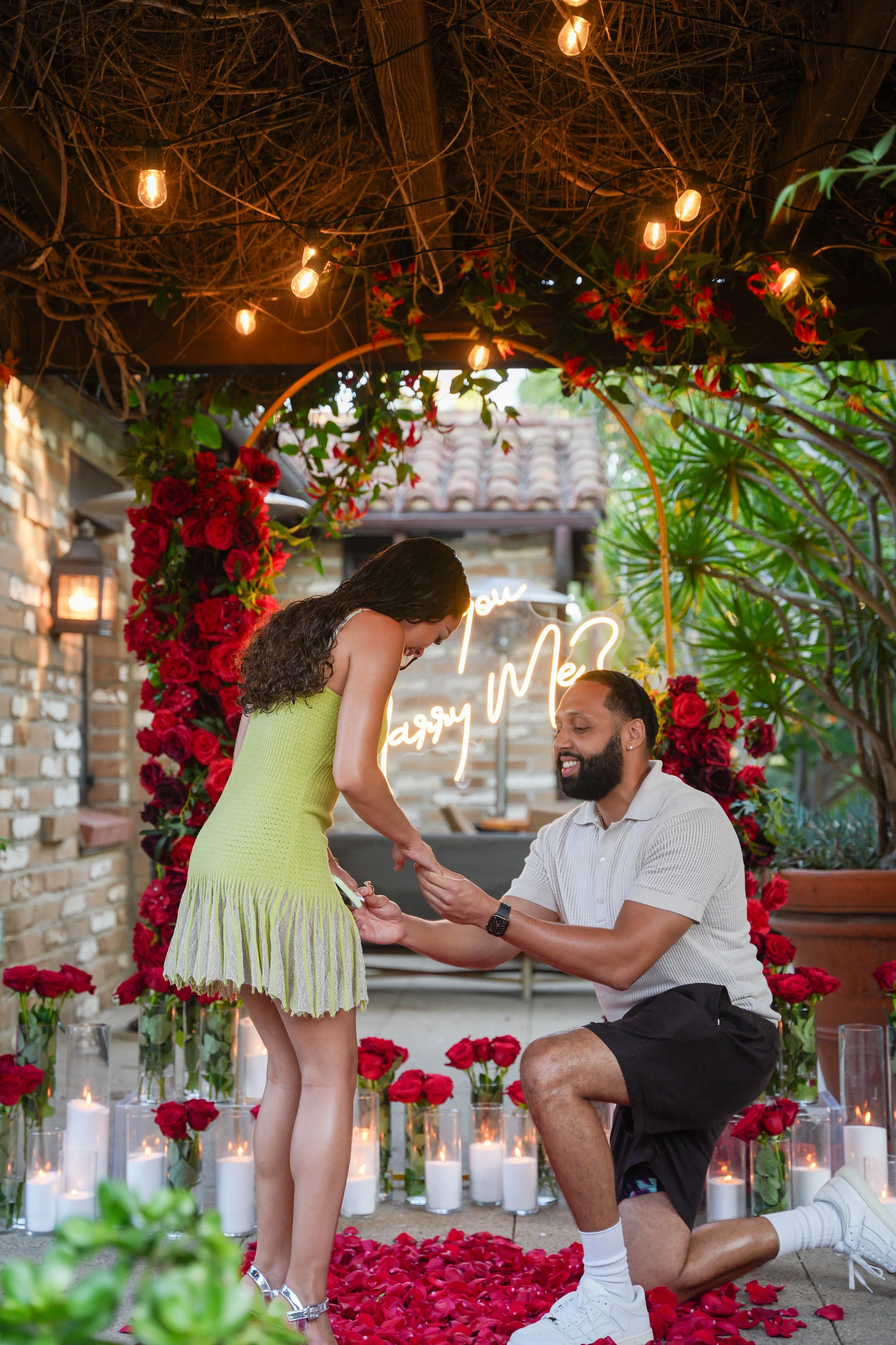 Romantic proposal decorations arranged in the gardens of Estancia La Jolla Hotel &amp; Spa in San Diego.