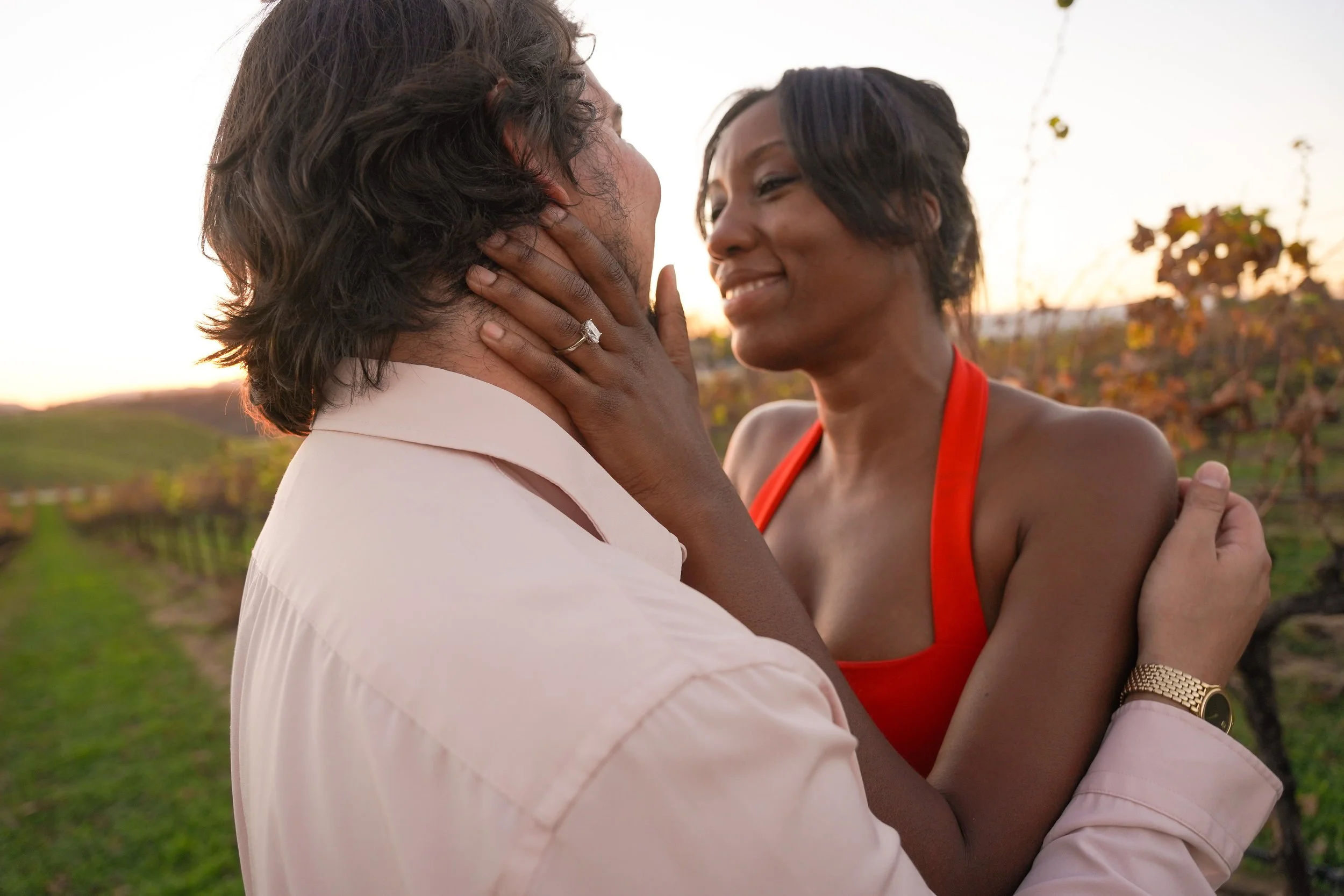 Elegant engagement portraits at Carter Estate Winery featuring rolling vineyards and natural light, captured by a Temecula proposal photographer.