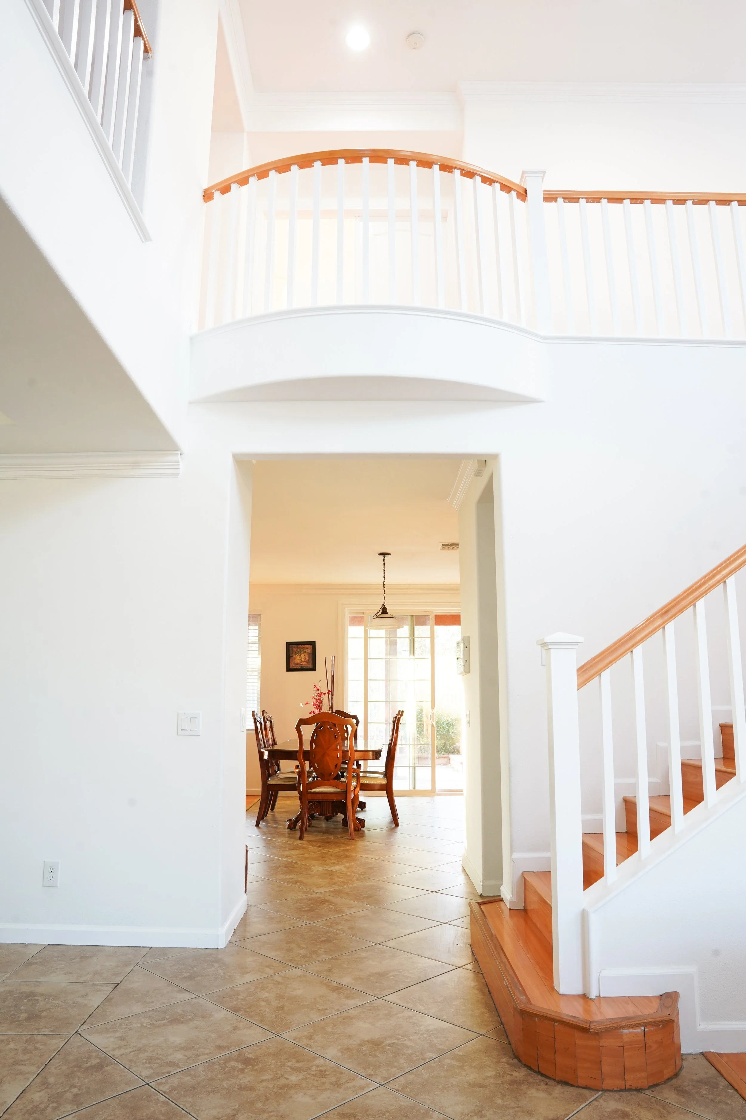 Real estate photography of modern interiors designed for hosting families.
