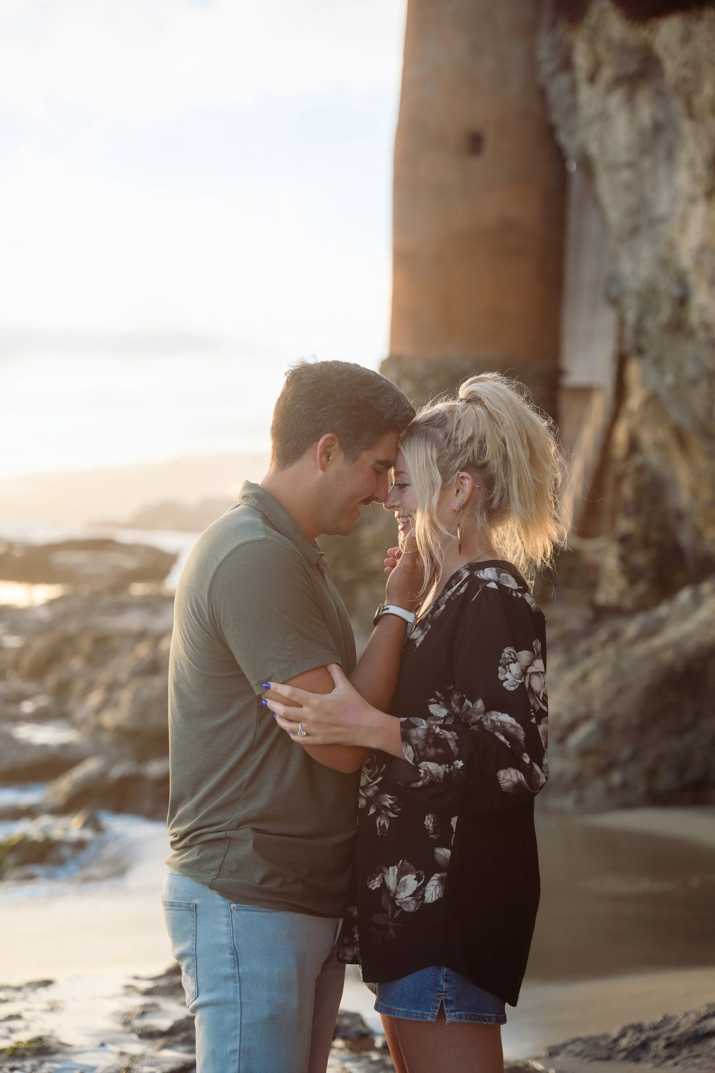 Timeless proposal photography at Victoria Beach in Laguna Beach overlooking the Pacific Ocean at sunset.