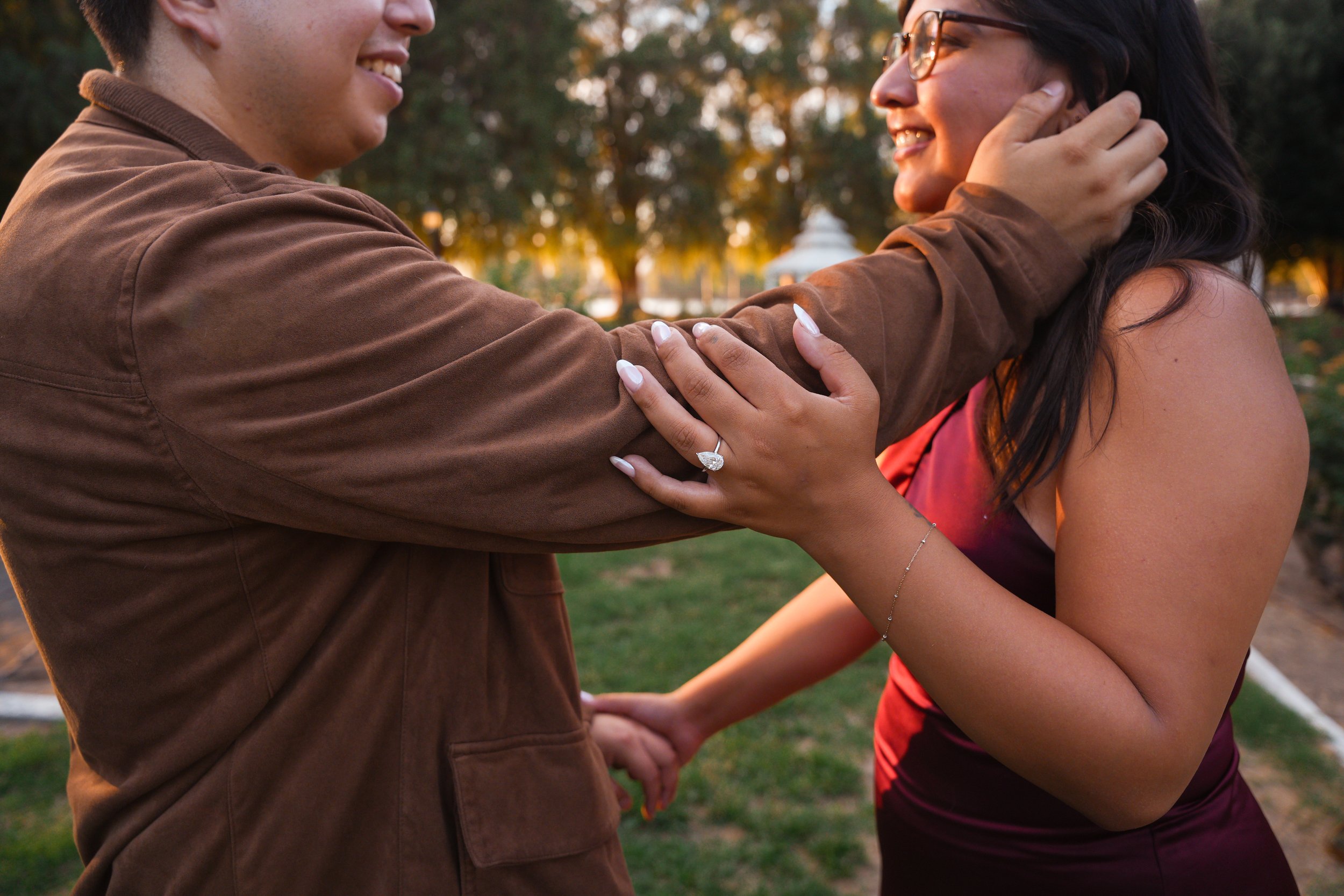 Emotional proposal moment captured at Fairmount Park in Riverside.