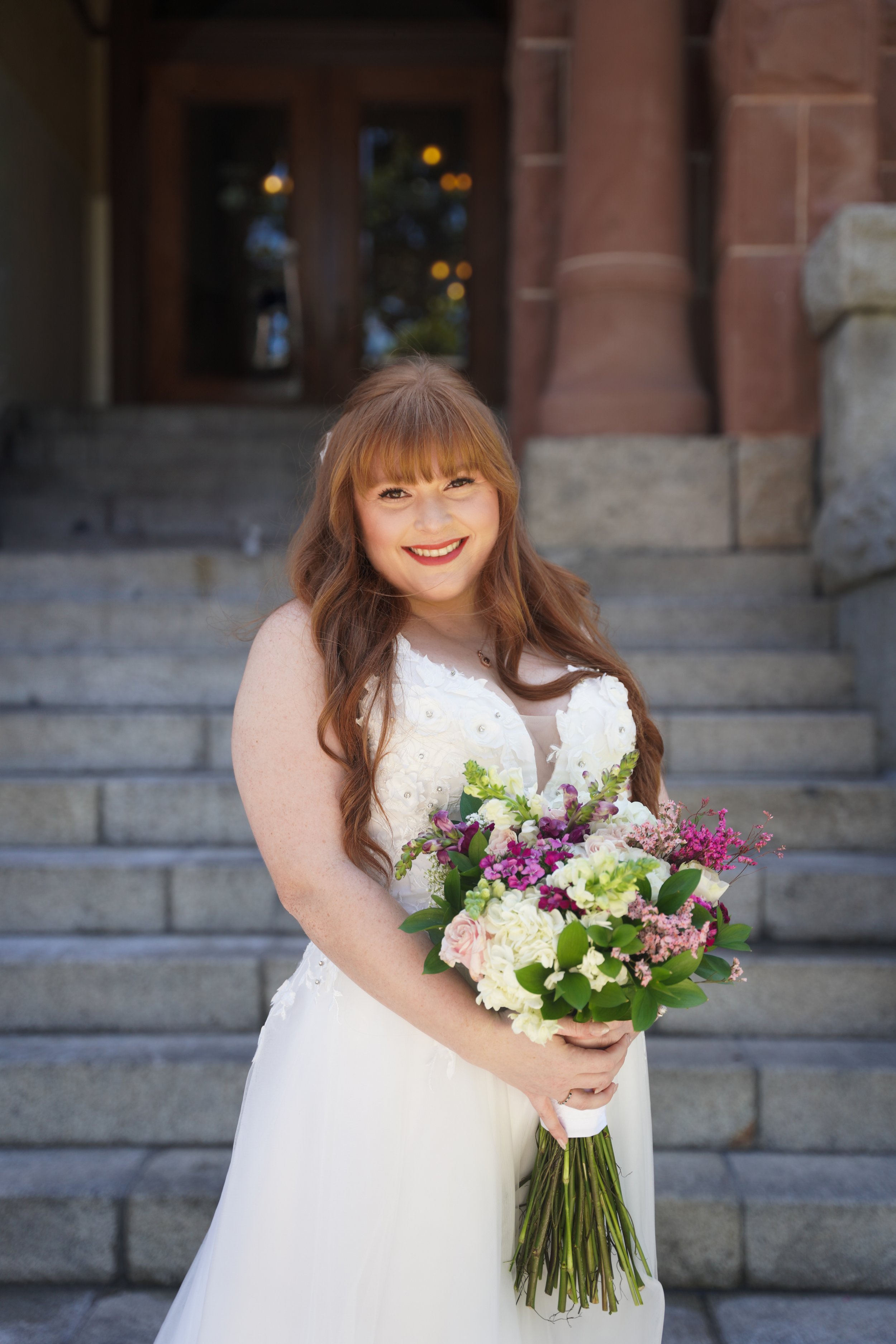 Beautiful, timeless moments captured of Joshua & Colleen at the historic OC Courthouse in Santa Ana. Civil courthouse wedding photography that tells your story—book us today.