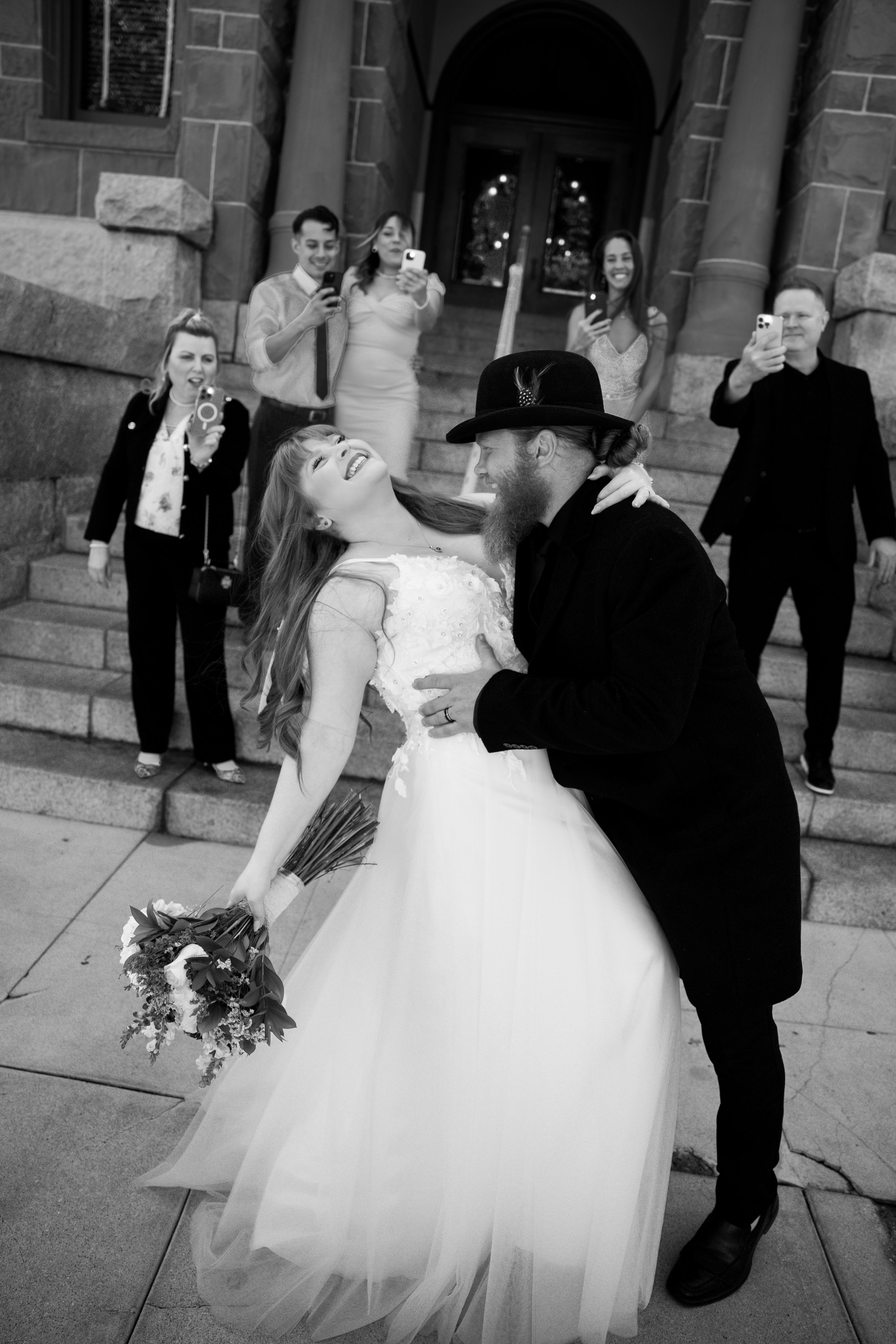 Captured the love and joy of Joshua and Colleen at the historic OC Courthouse in Santa Ana. Ready to make your moment unforgettable? Book with us today!