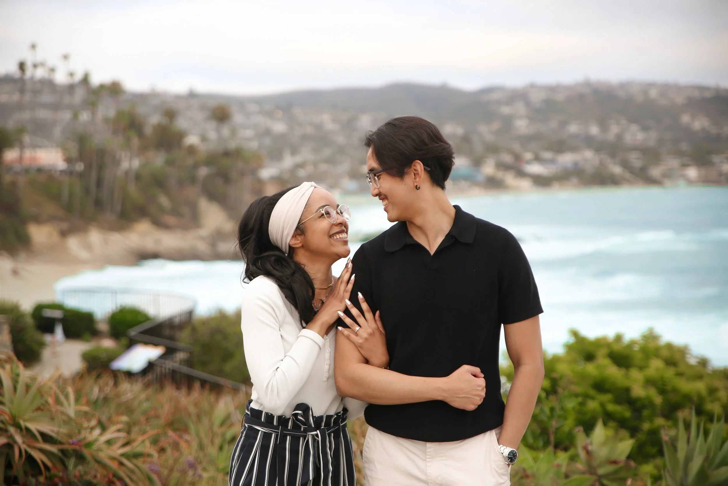 Laguna Beach engagement photographer capturing timeless couple portraits at Heisler Park during golden hour.