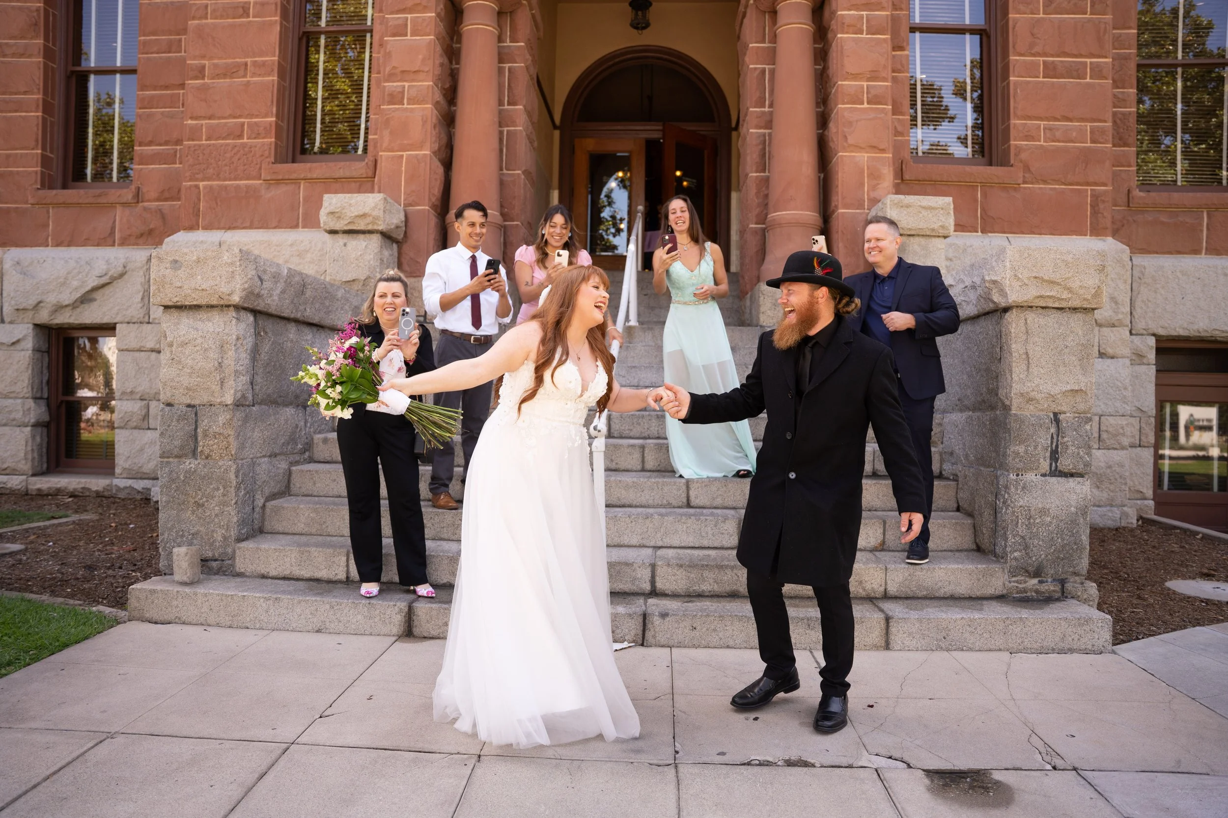 Civil marriage at the historic Old Orange County Courthouse. This couple booked our Elopement Package for their intimate celebration. 📸 Book your Orange County courthouse wedding photography today.
