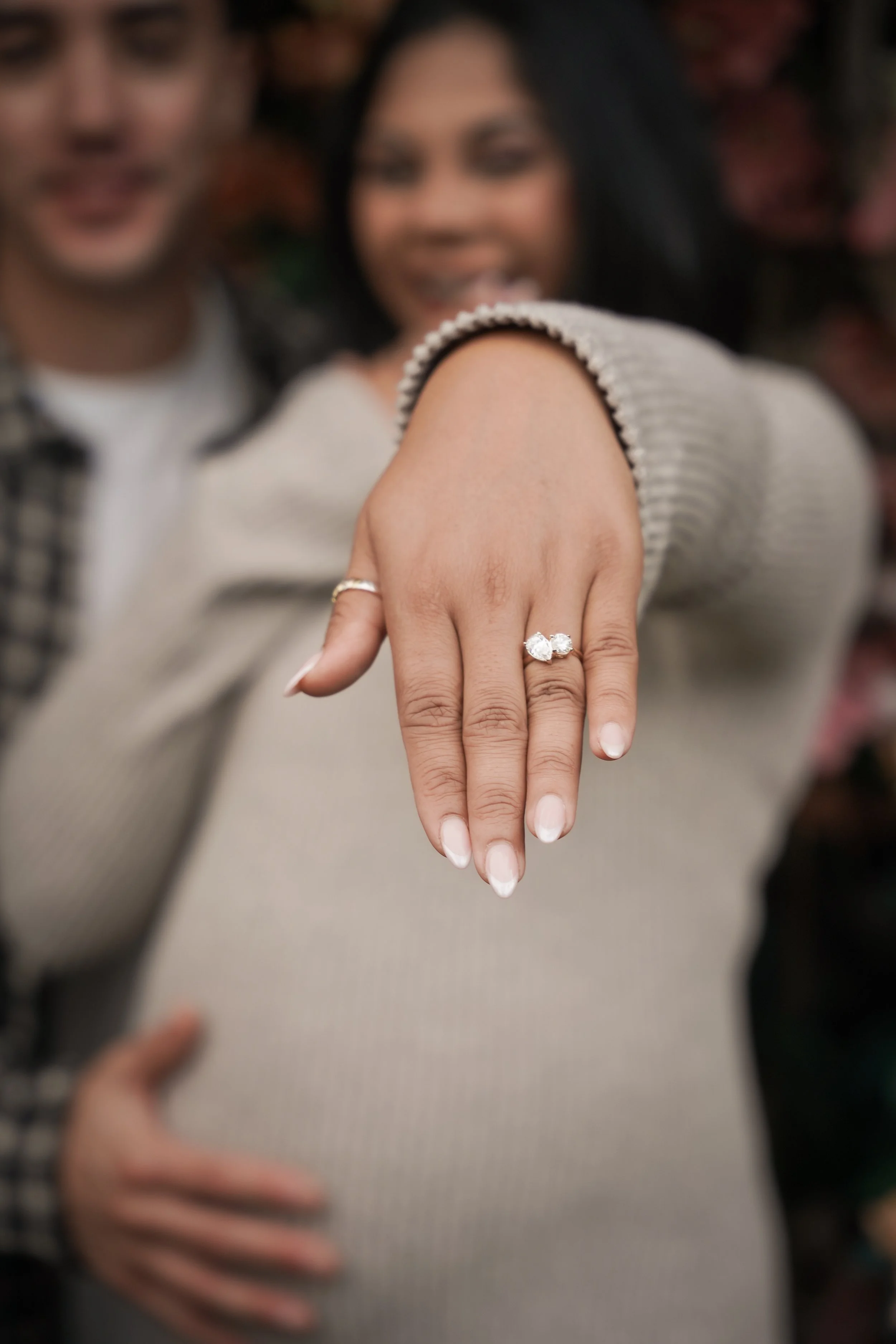 Close-up of the engagement ring reveal during the Estancia La Jolla Wishing Tree proposal, capturing emotion and detail.