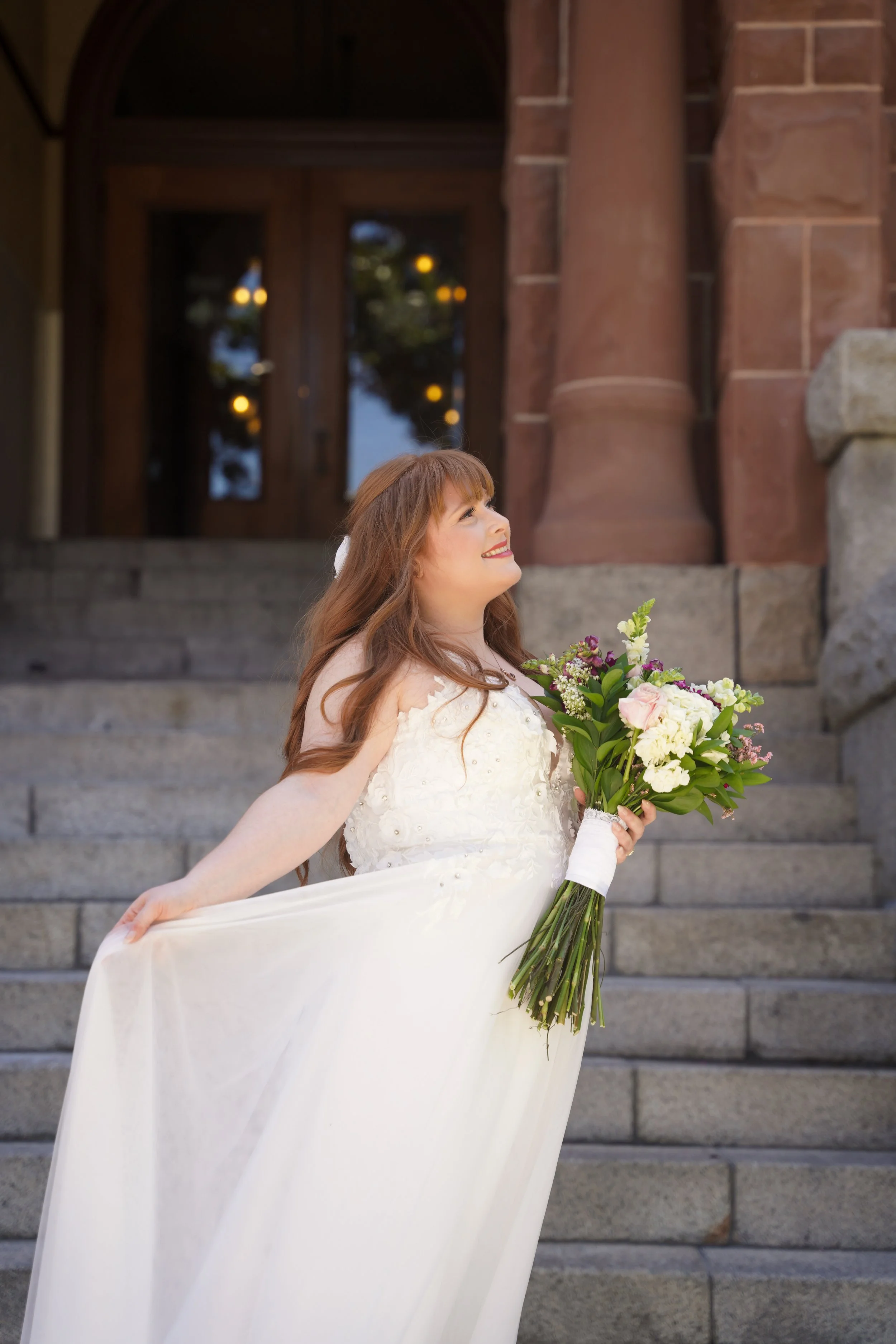 Beautiful, timeless moments captured of Joshua & Colleen at the historic OC Courthouse in Santa Ana. Civil courthouse wedding photography that tells your story—book us today.